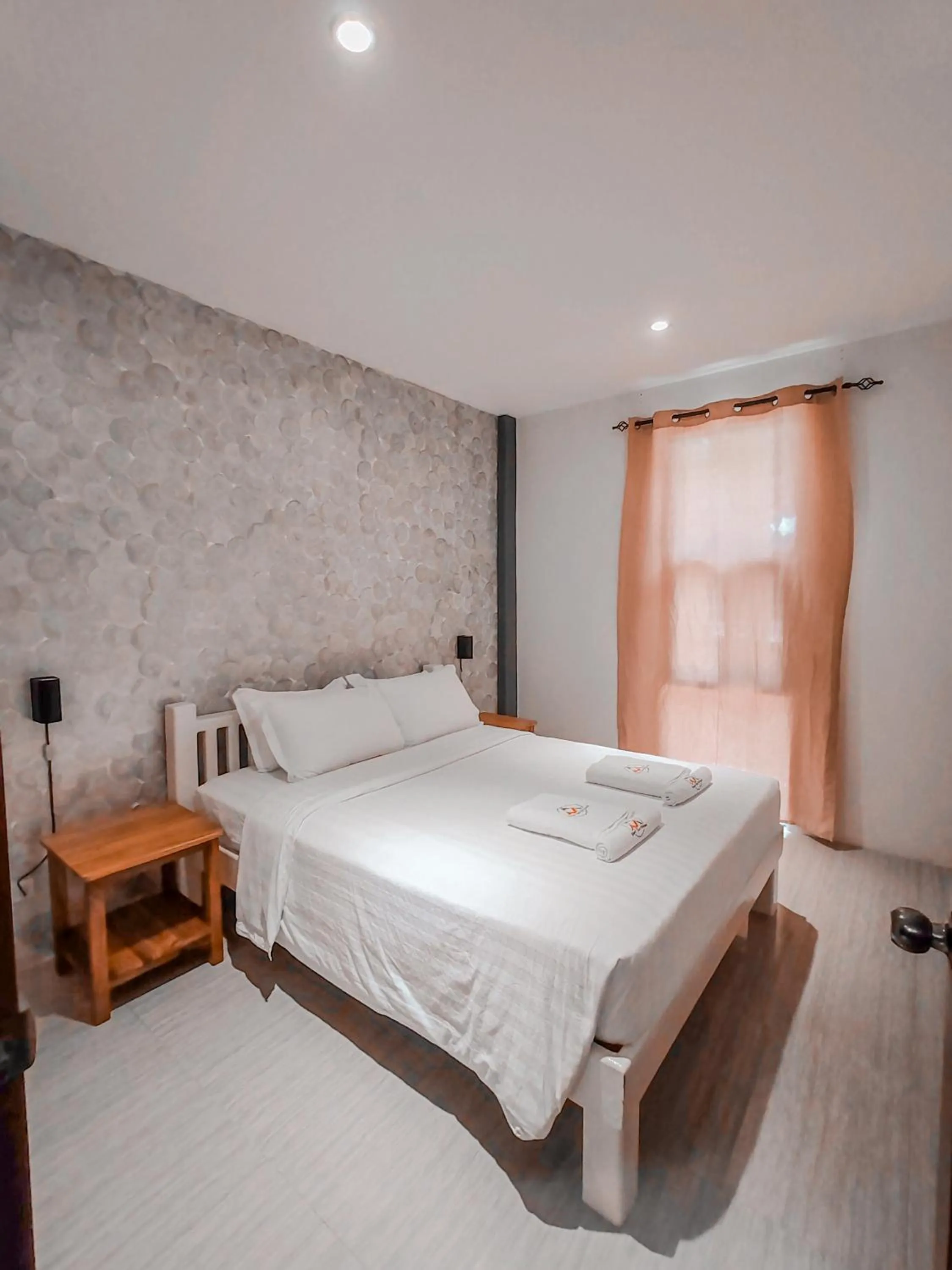 Bed in Alona Northland Resort