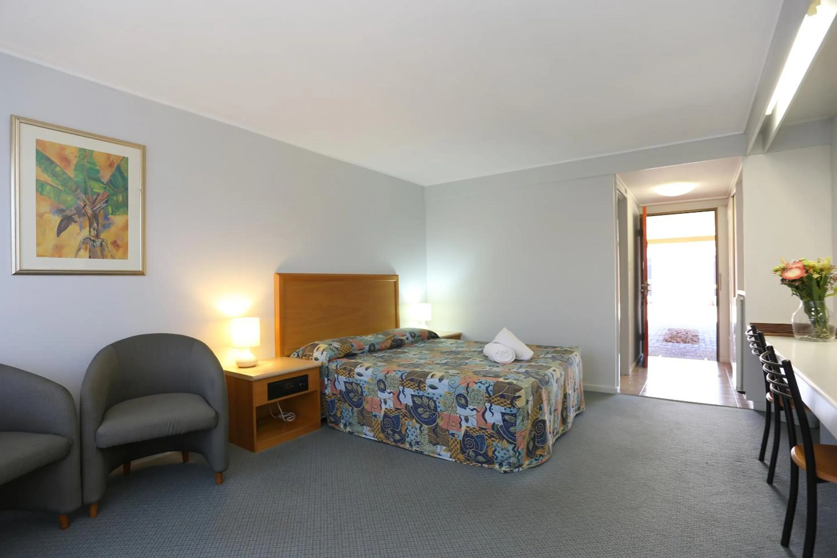 Bed in Reef Resort Motel