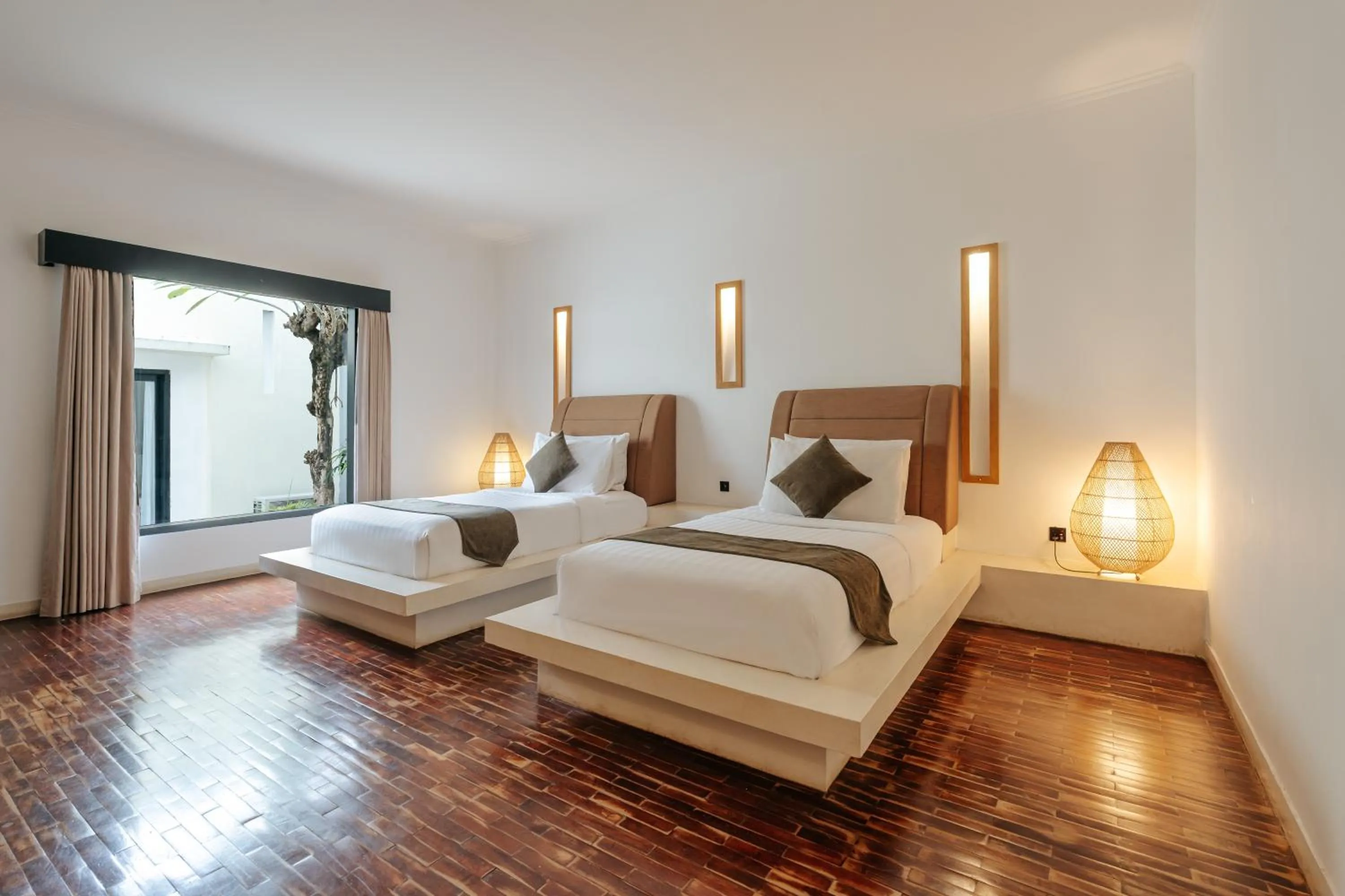 Bed in The Seminyak Suites Private Villas