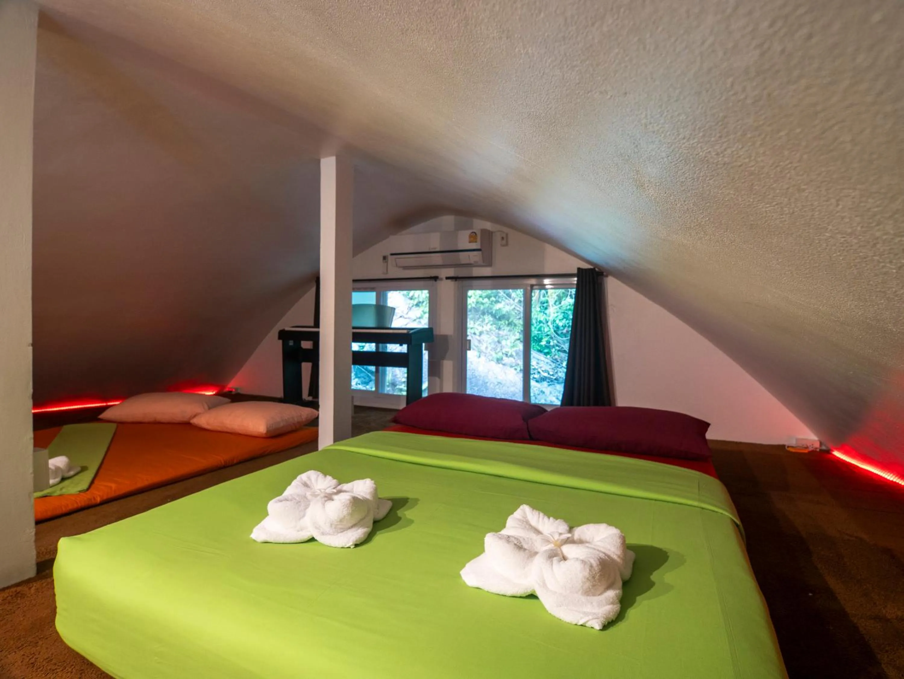 Bed in Monkey Flower Villas