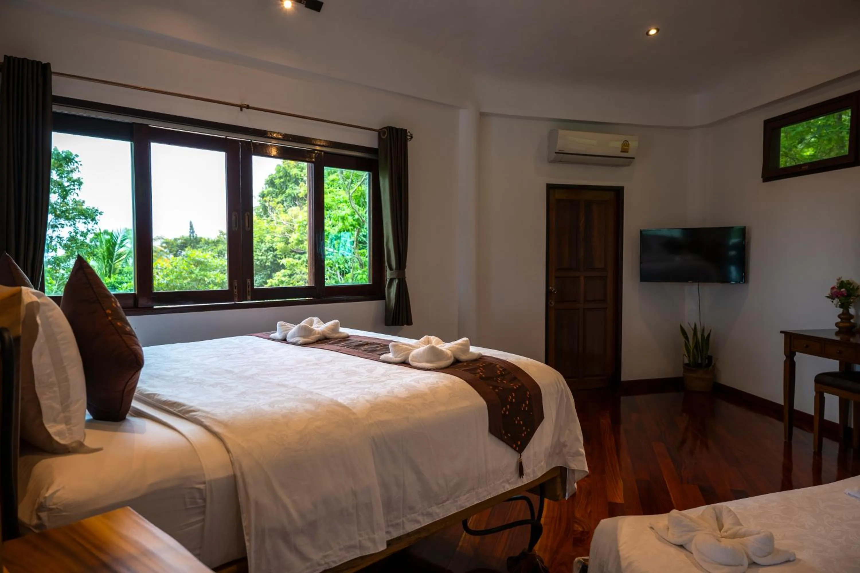 Bed in Monkey Flower Villas