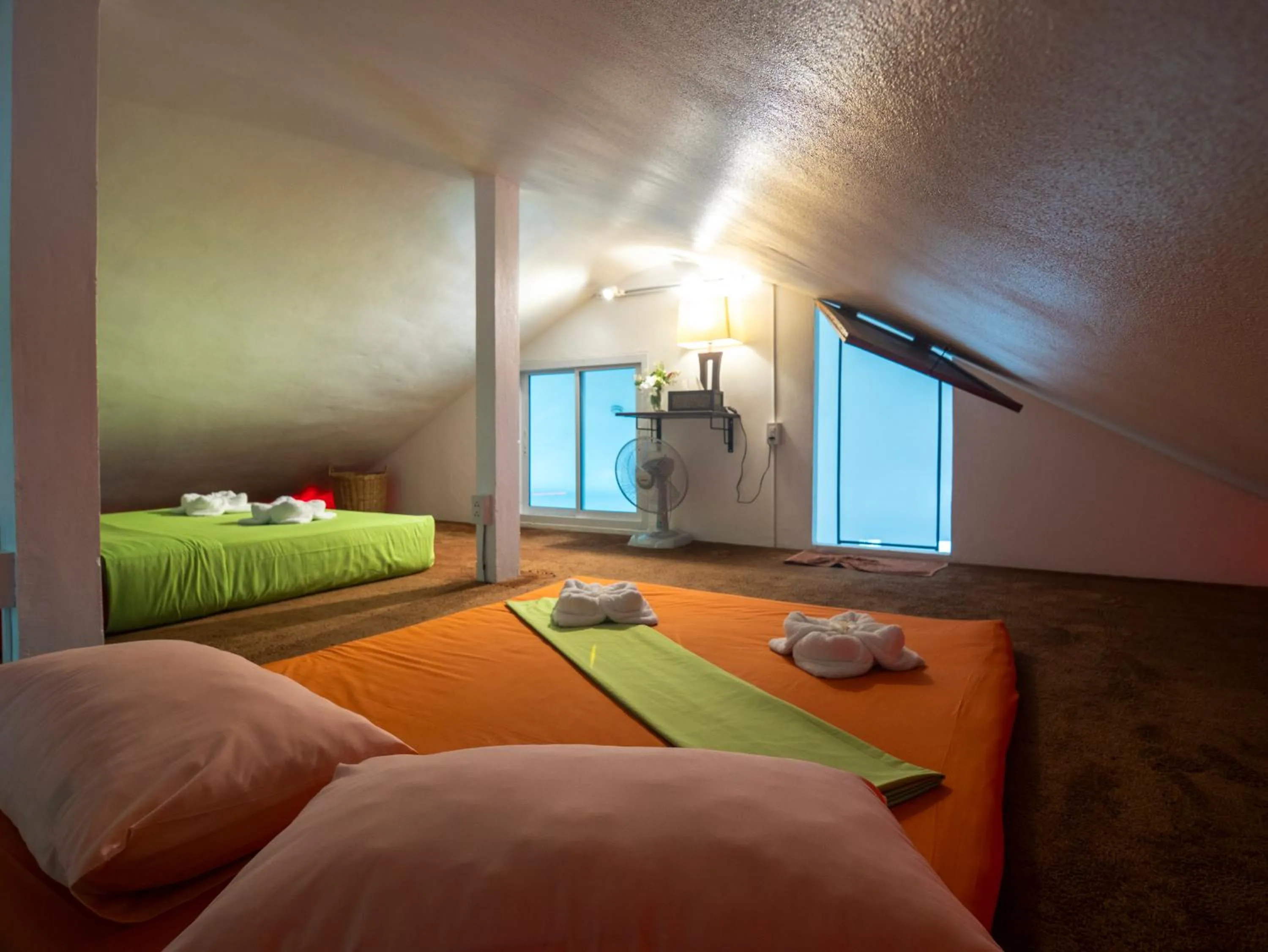 Bed in Monkey Flower Villas