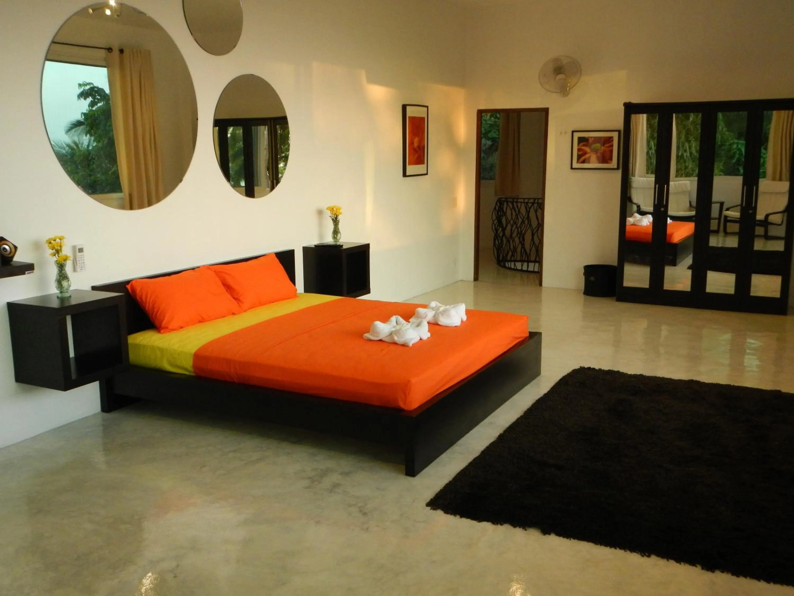 Bed in Monkey Flower Villas