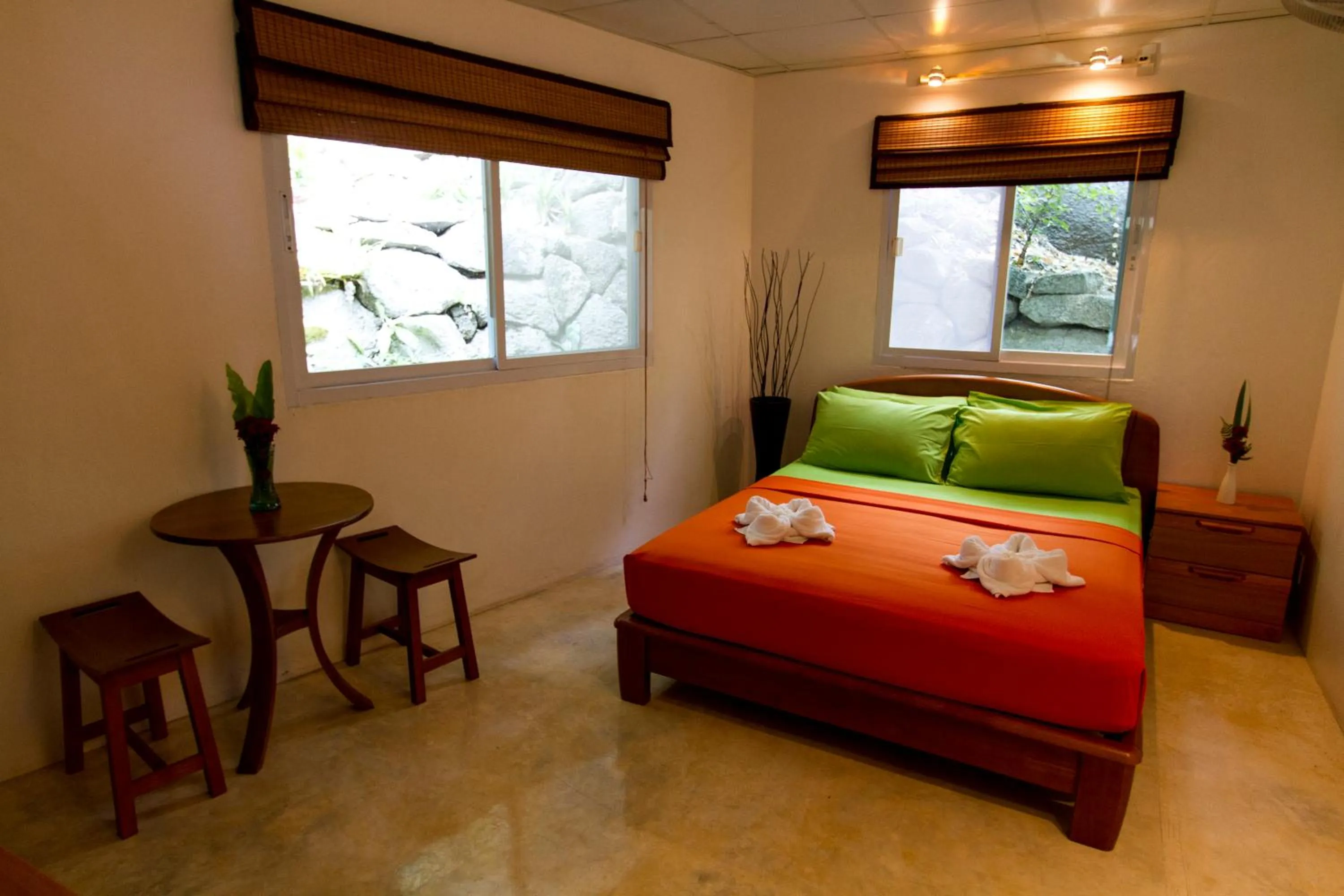 Bed in Monkey Flower Villas