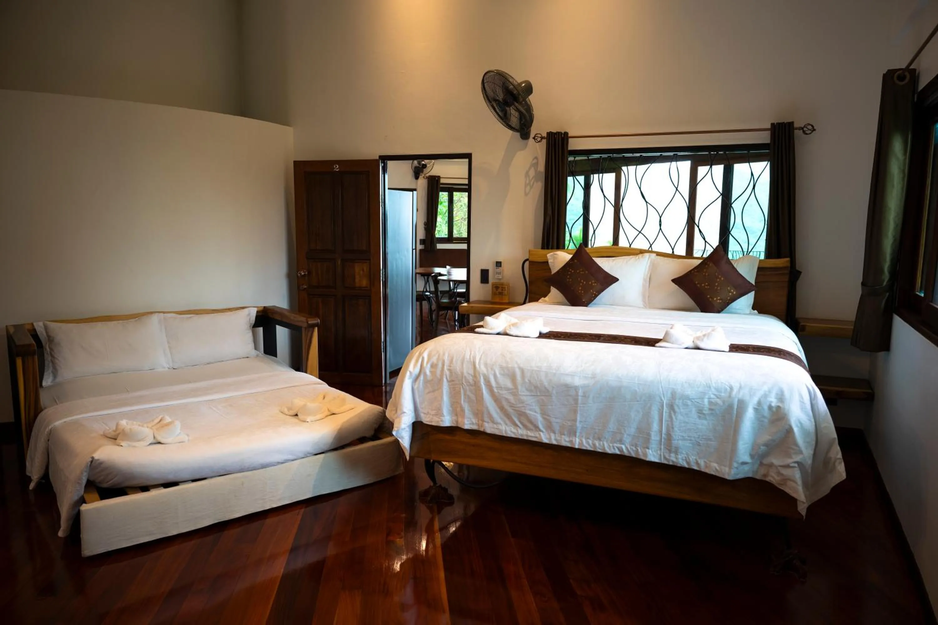 Bed in Monkey Flower Villas