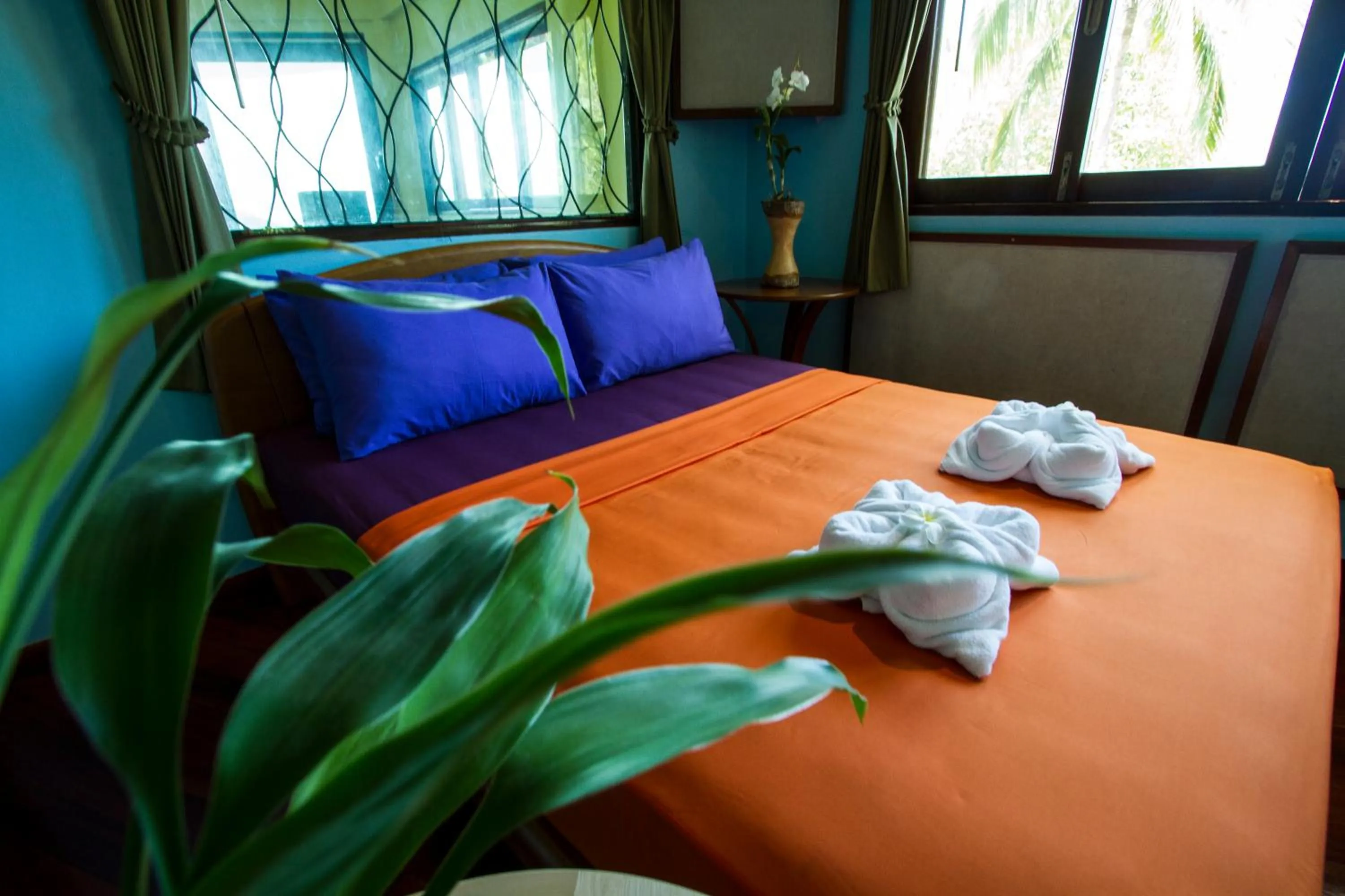 Bed in Monkey Flower Villas