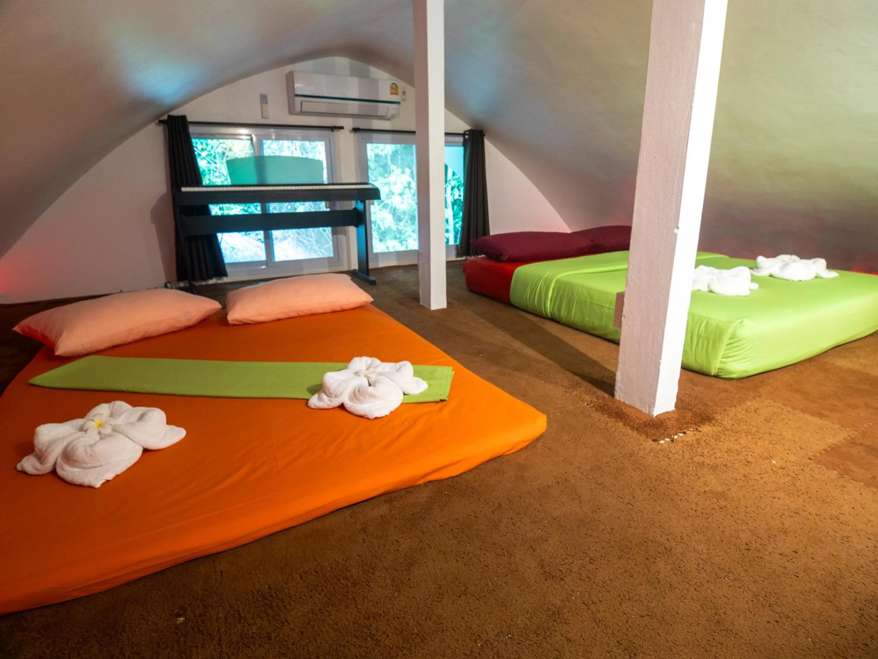 Bed in Monkey Flower Villas