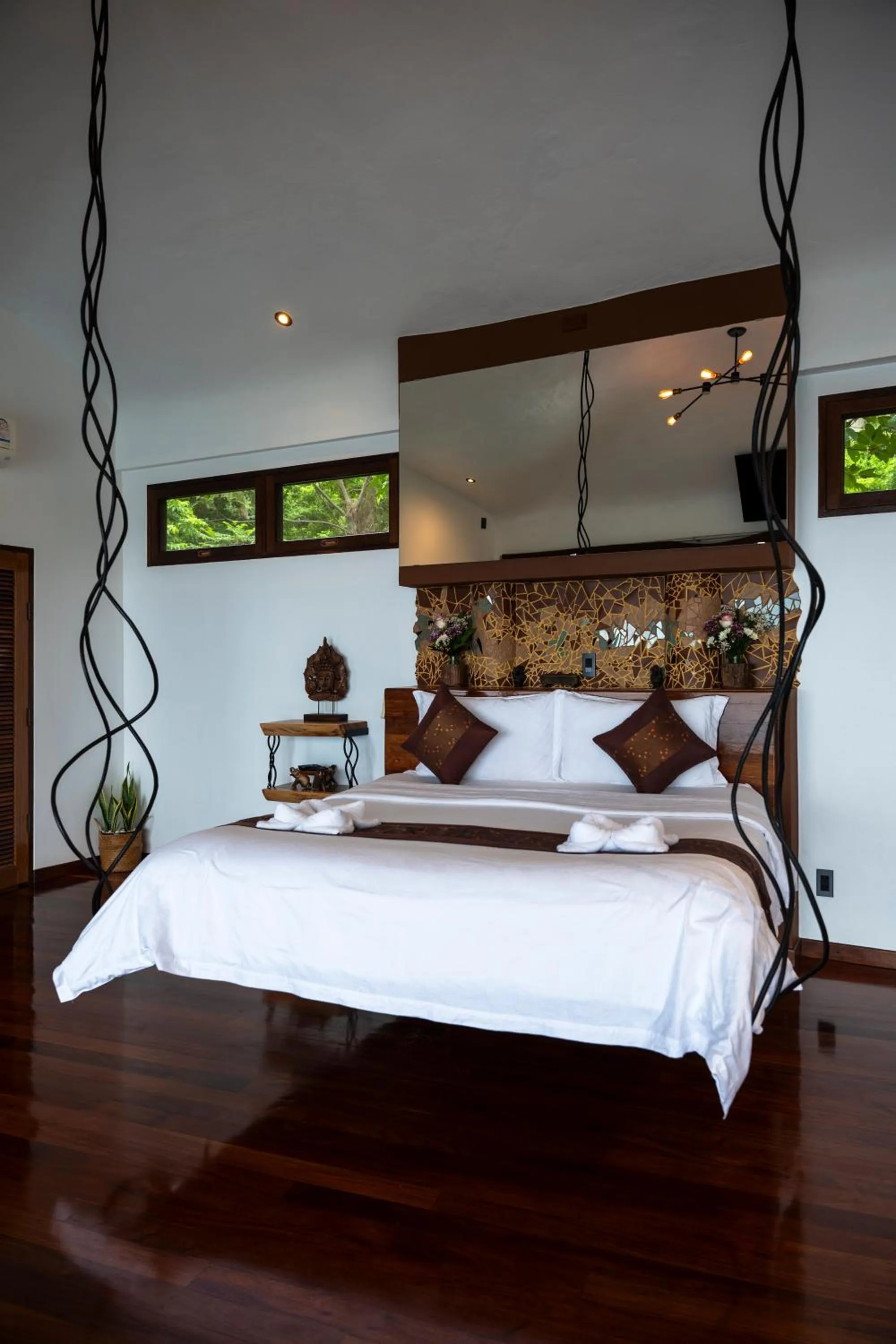Bed in Monkey Flower Villas