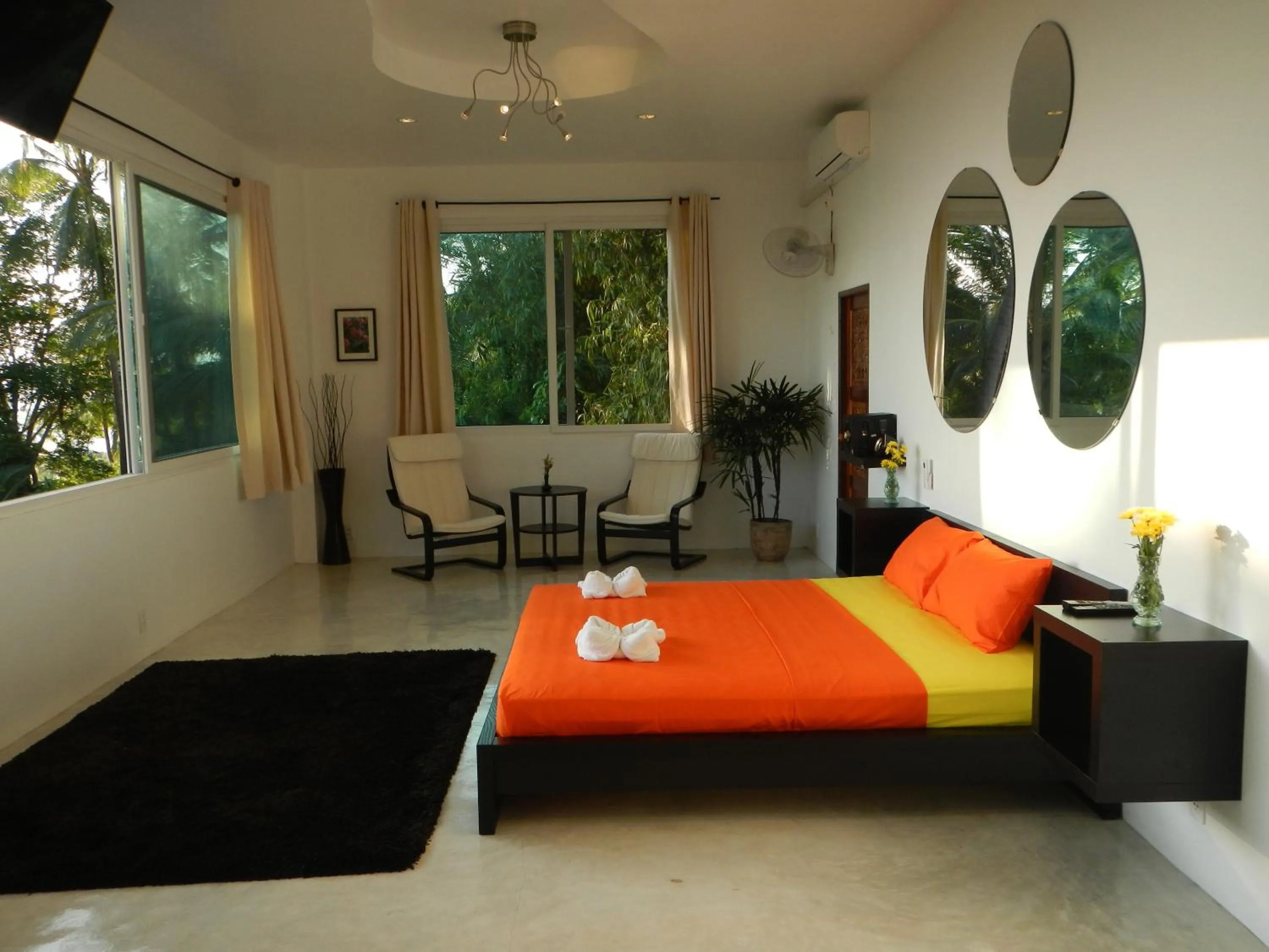 Bed in Monkey Flower Villas