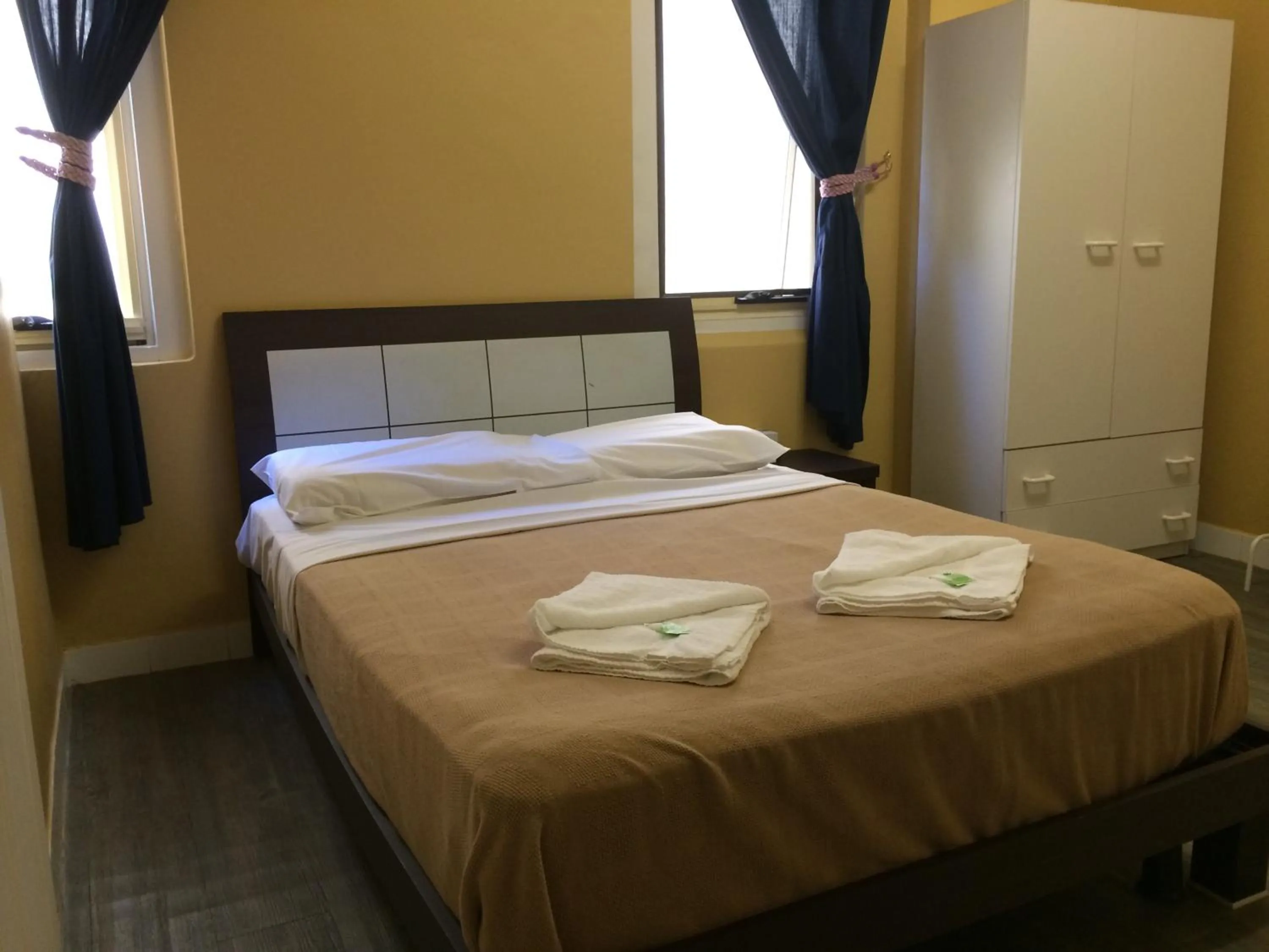 Photo of the whole room, Bed in Central Private Hotel