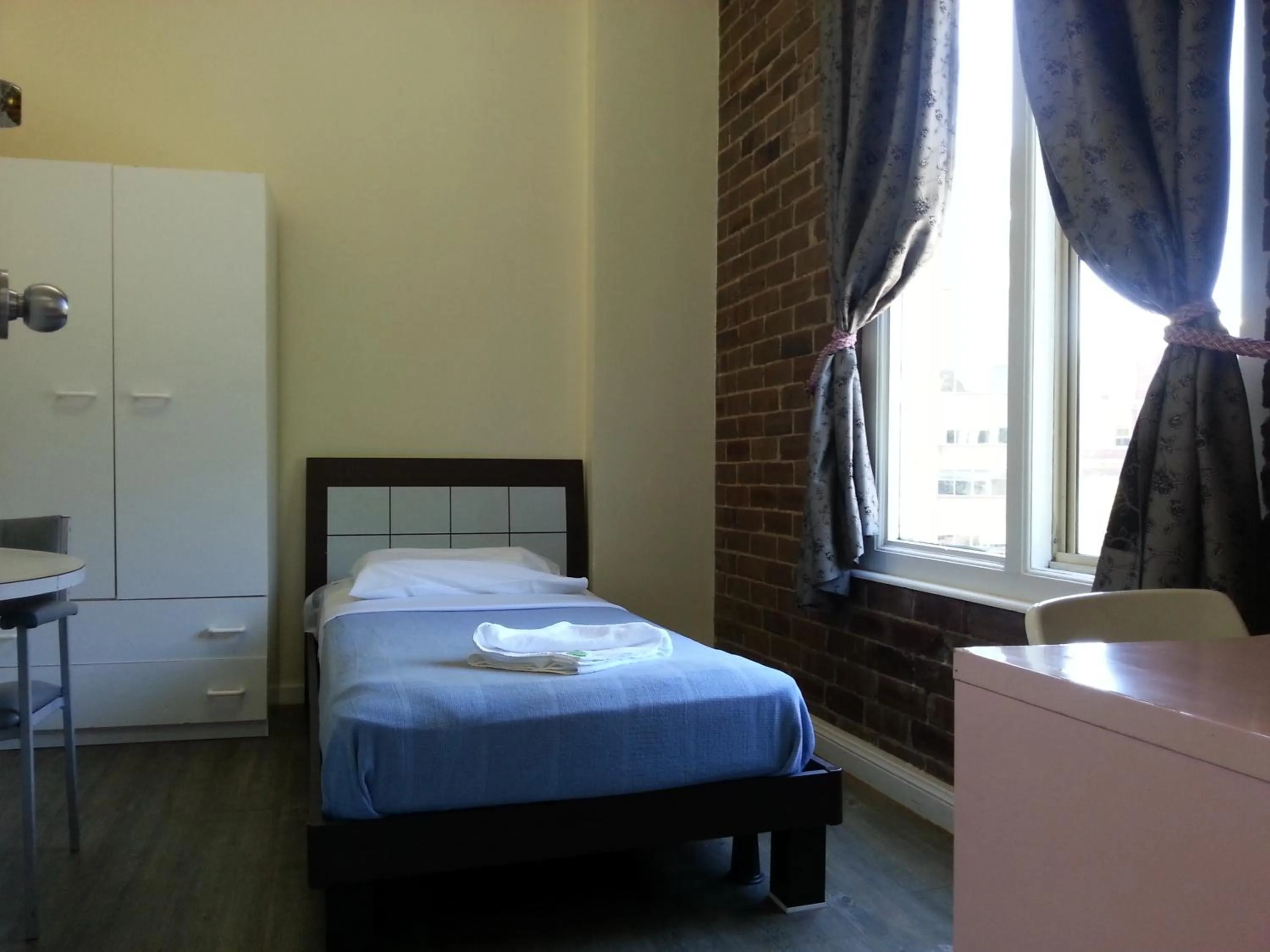 Photo of the whole room, Bed in Central Private Hotel