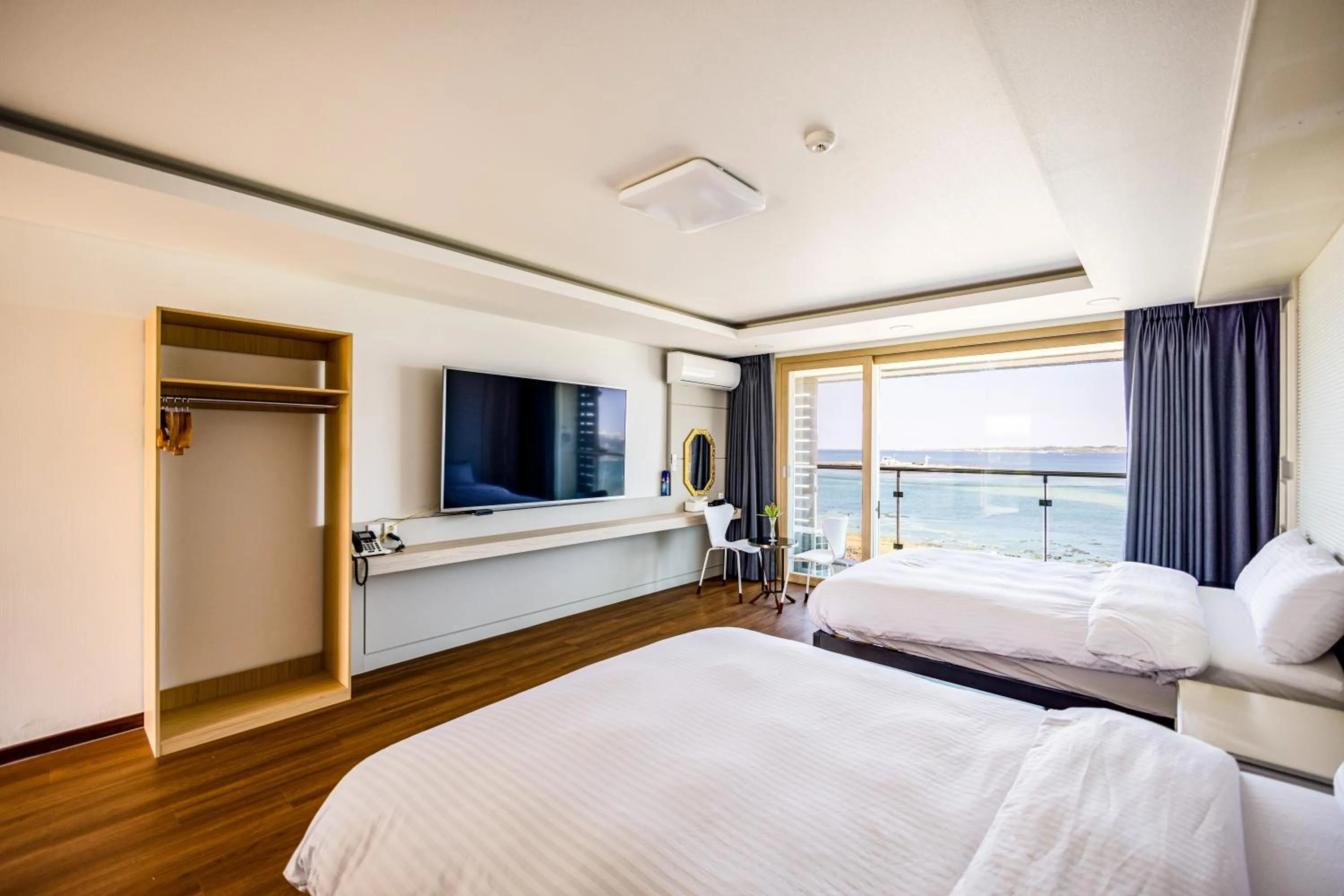 Bed in Jeju Arumdaun Resort