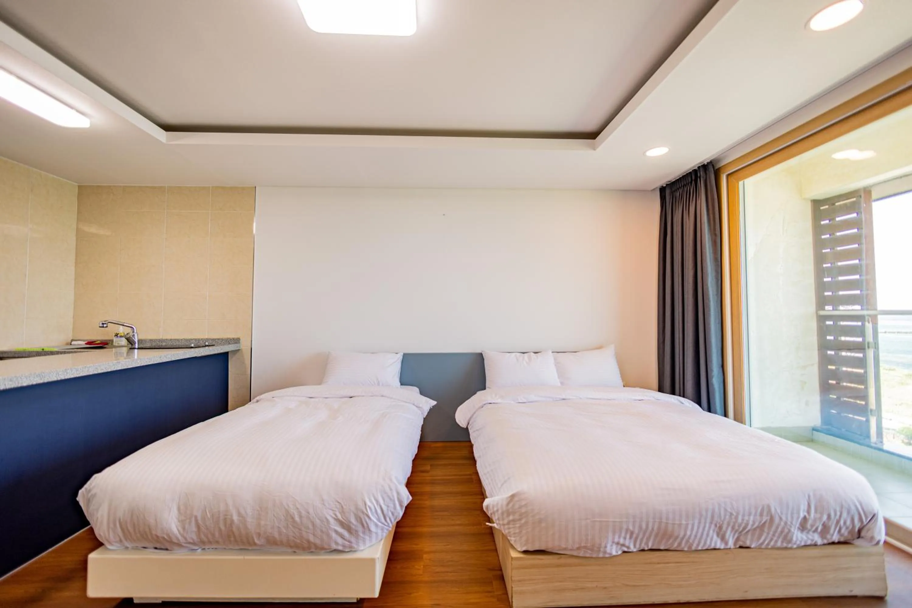 Bed in Jeju Arumdaun Resort