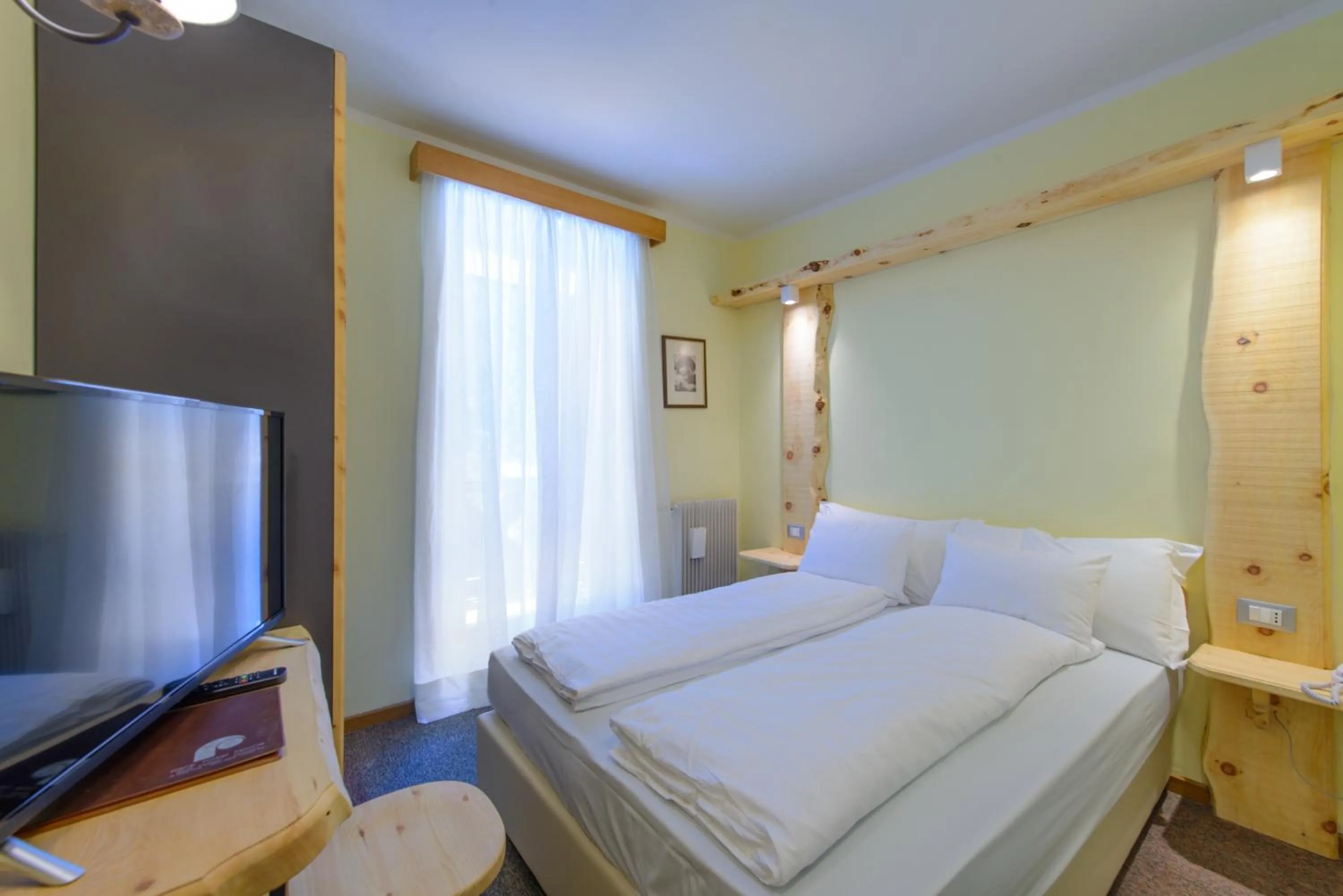 Bed in Park Hotel Faloria