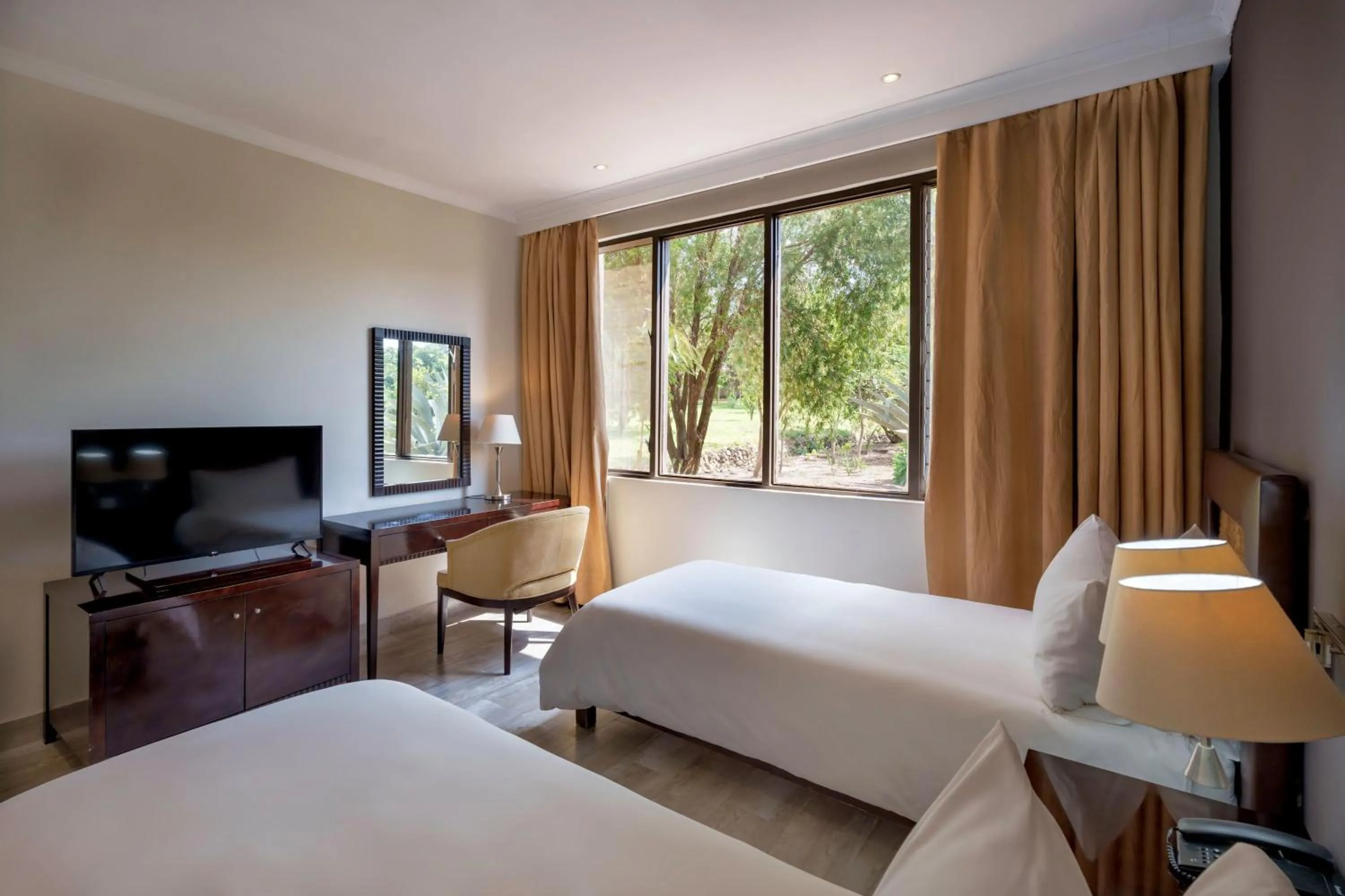 Photo of the whole room, Bed in Protea Hotel by Marriott Chipata