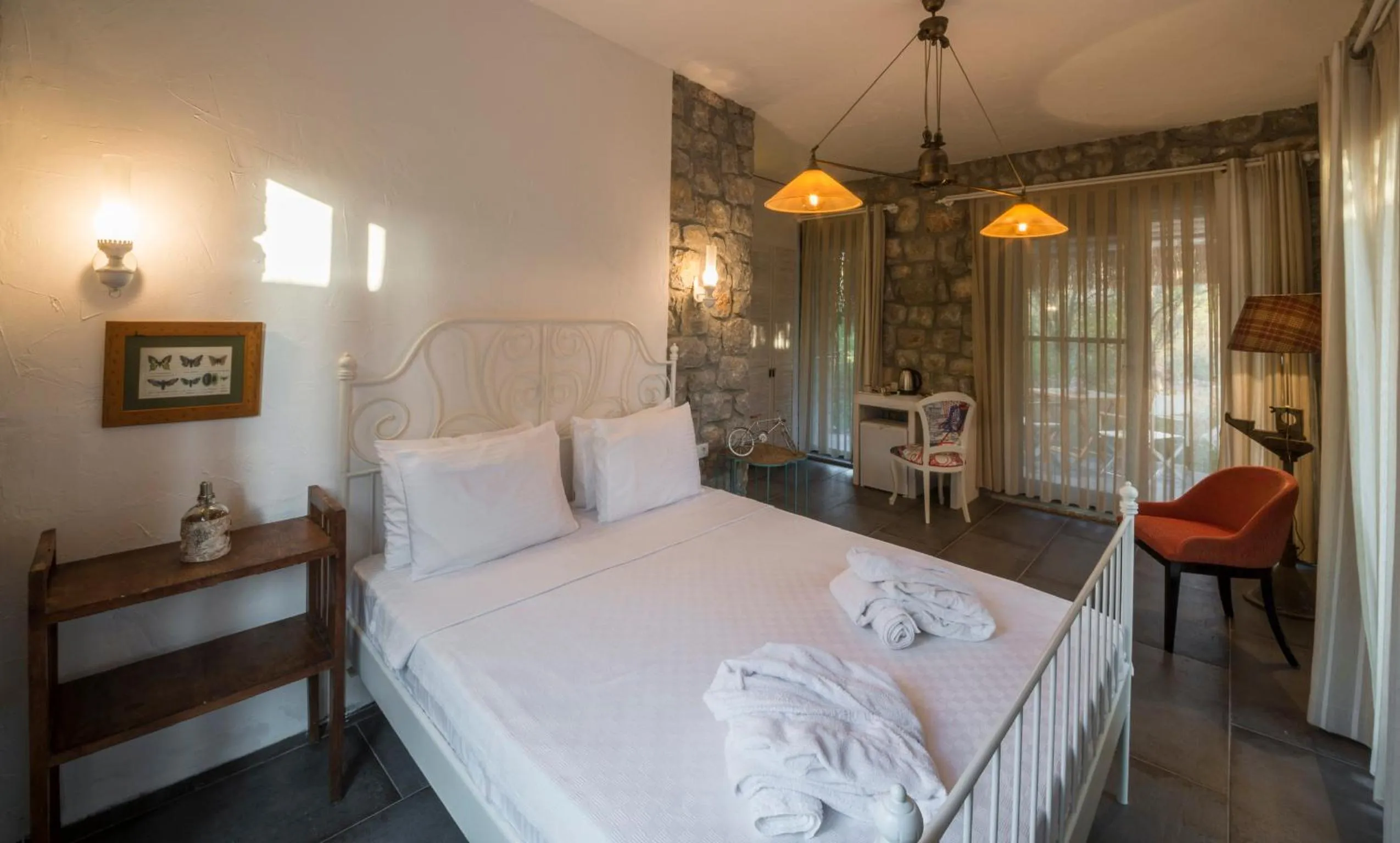 Bed in Valentina Boutique Hotel