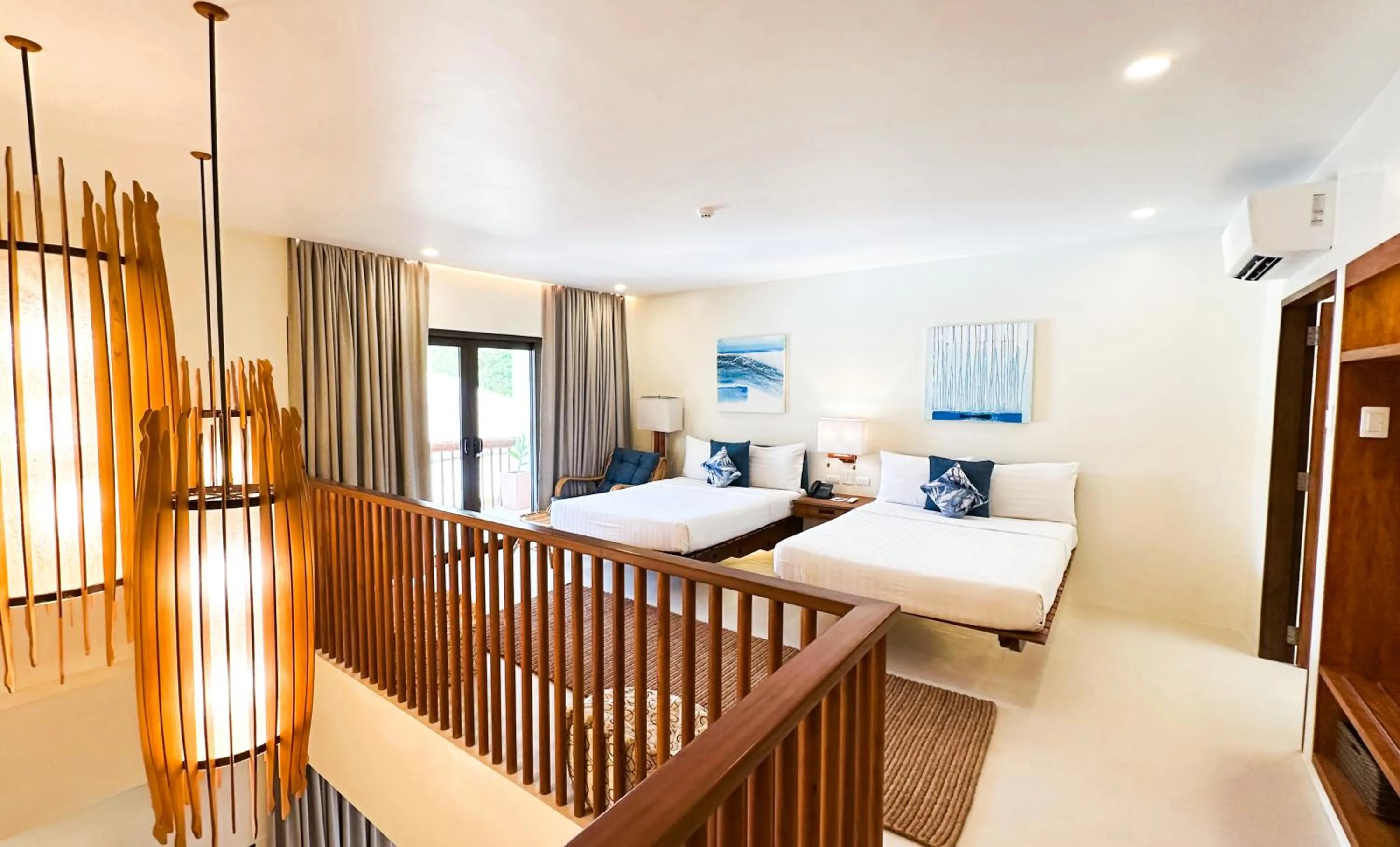 Bed in Bluewater Panglao Beach Resort