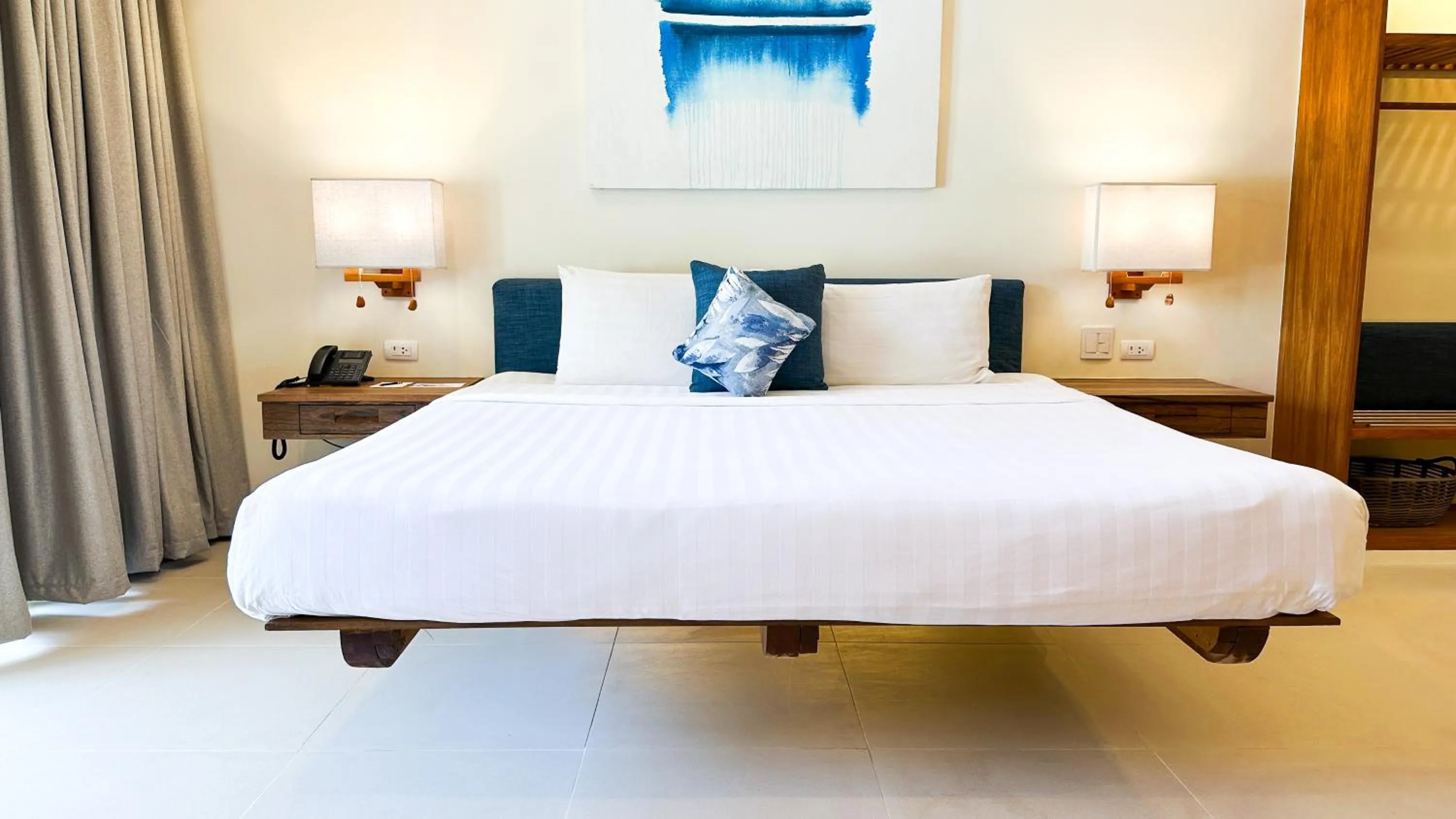 Bed in Bluewater Panglao Beach Resort