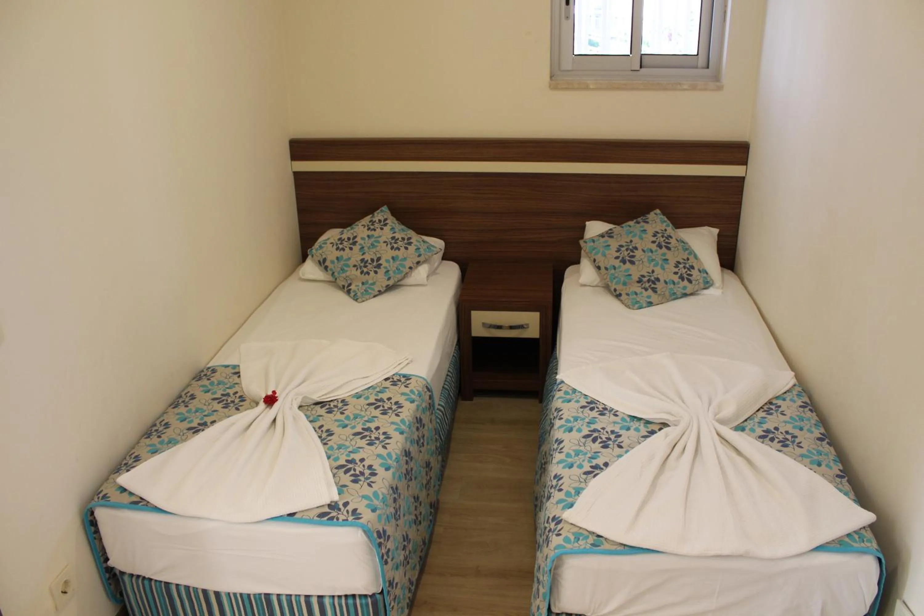 Bed in Side West Park Hotel