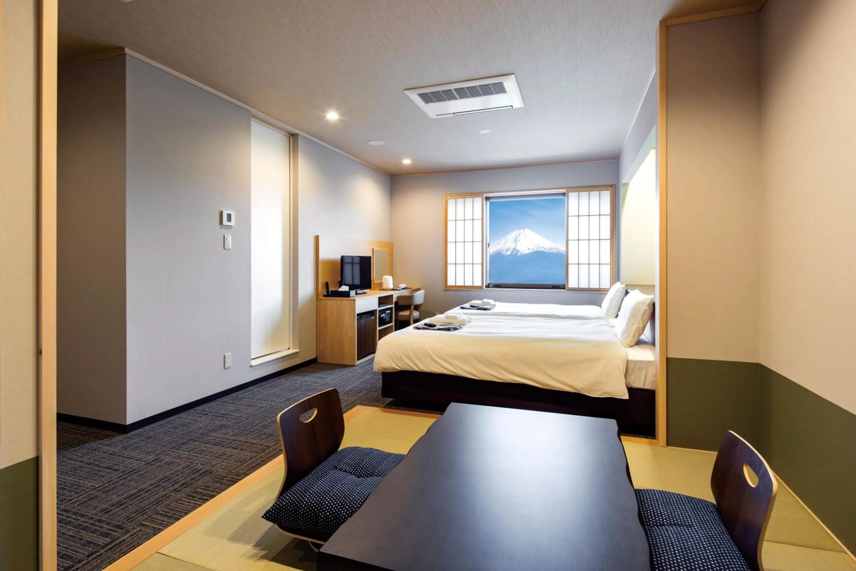 Bed in Fujikawaguchiko Resort Hotel