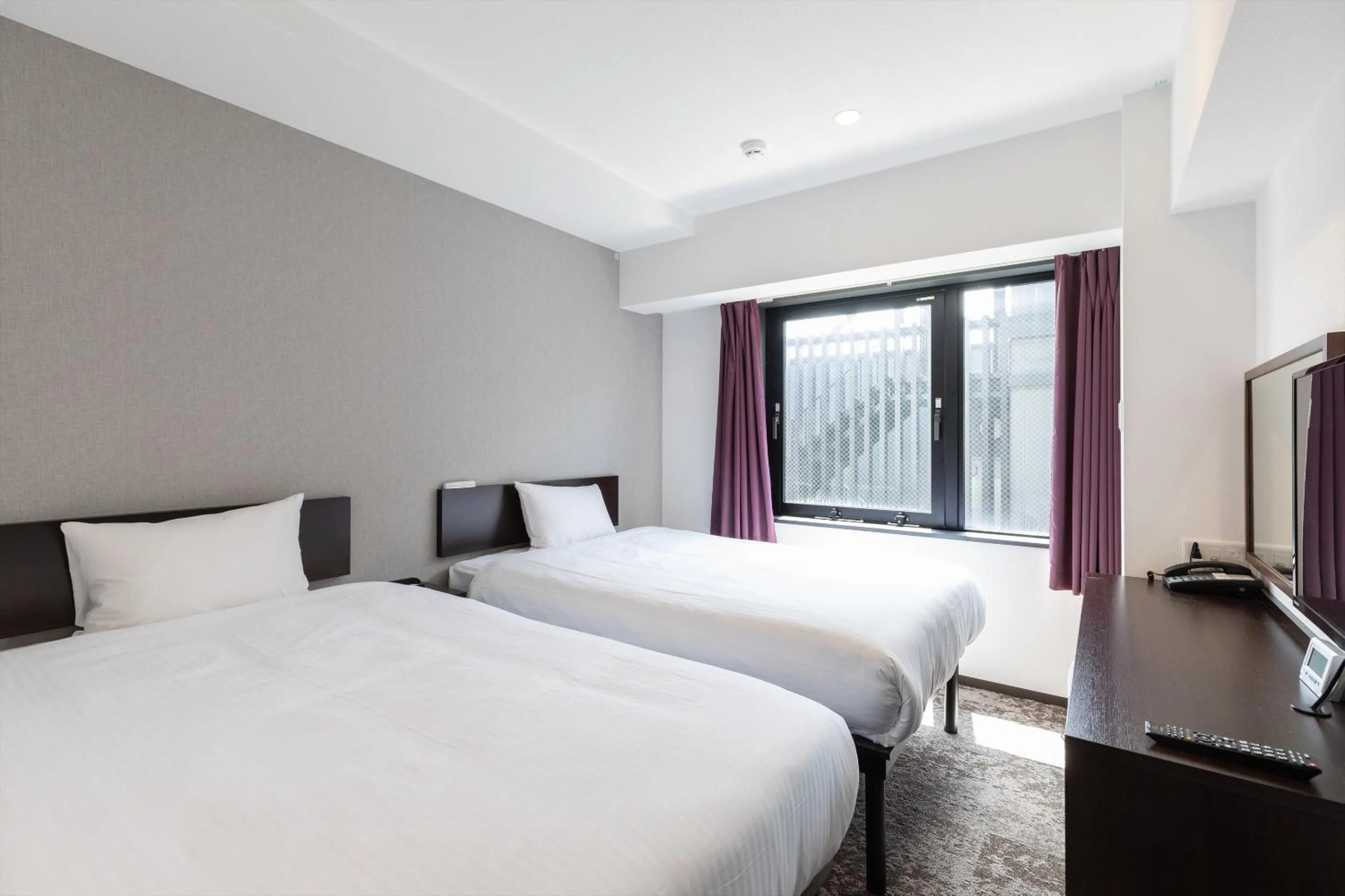 Bed in Hotel Tetora Kyoto Station