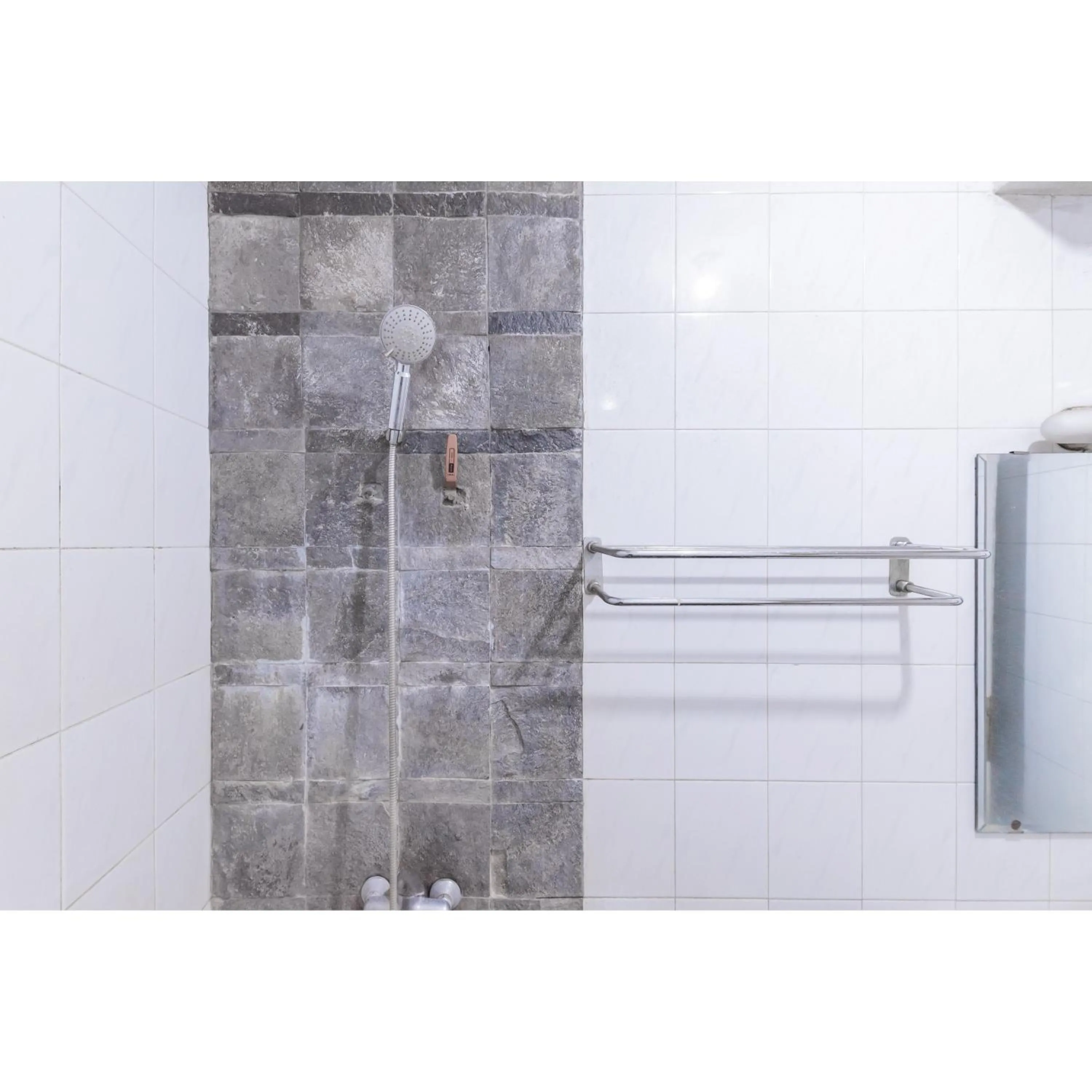 Bathroom in Urbanview Hotel Utari