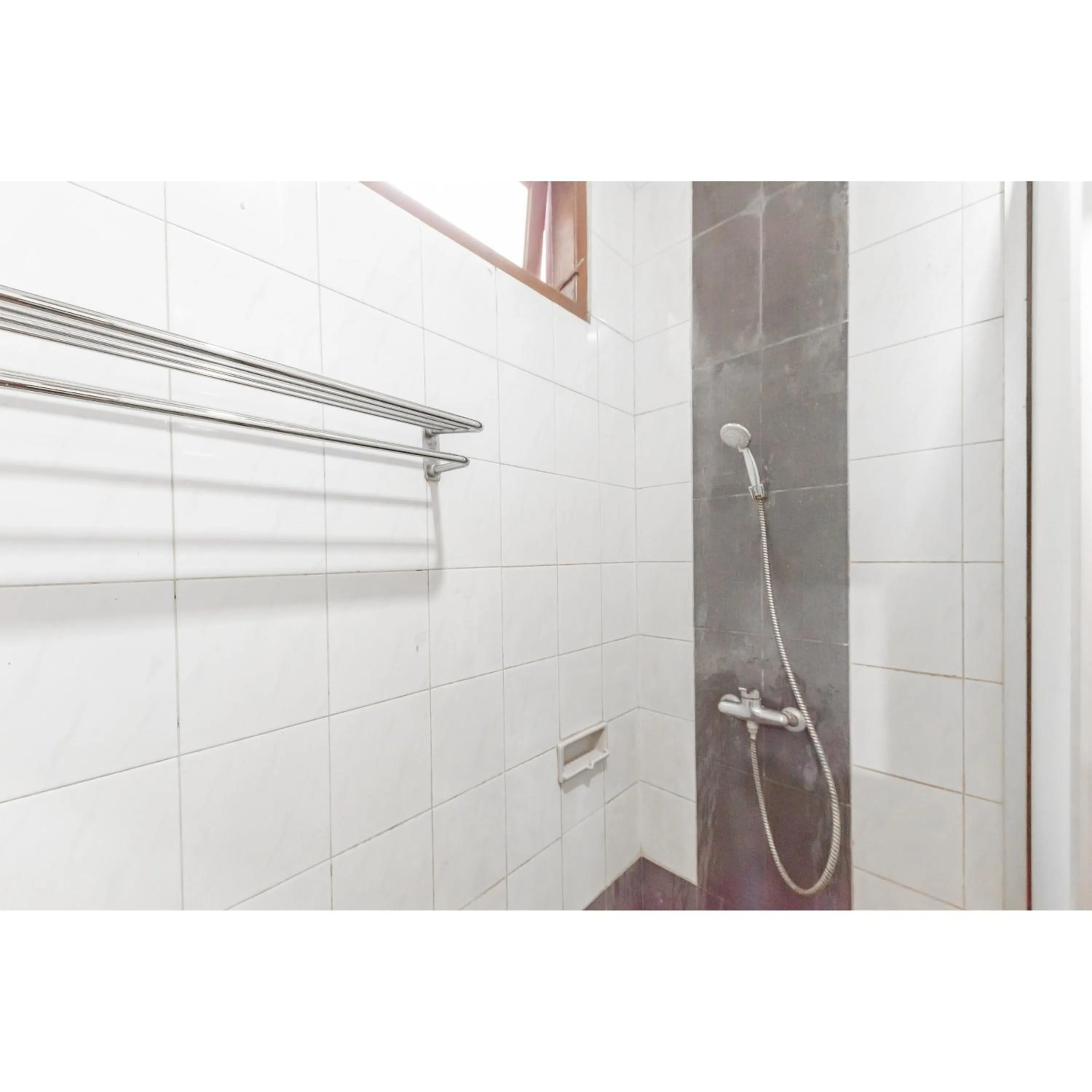 Bathroom in Urbanview Hotel Utari