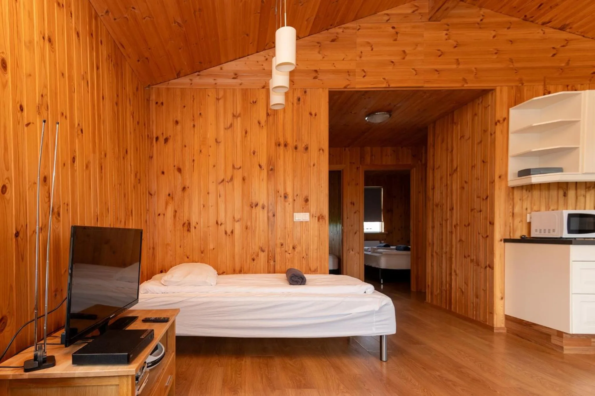 Living room, Bed in Gladheimar Cottages