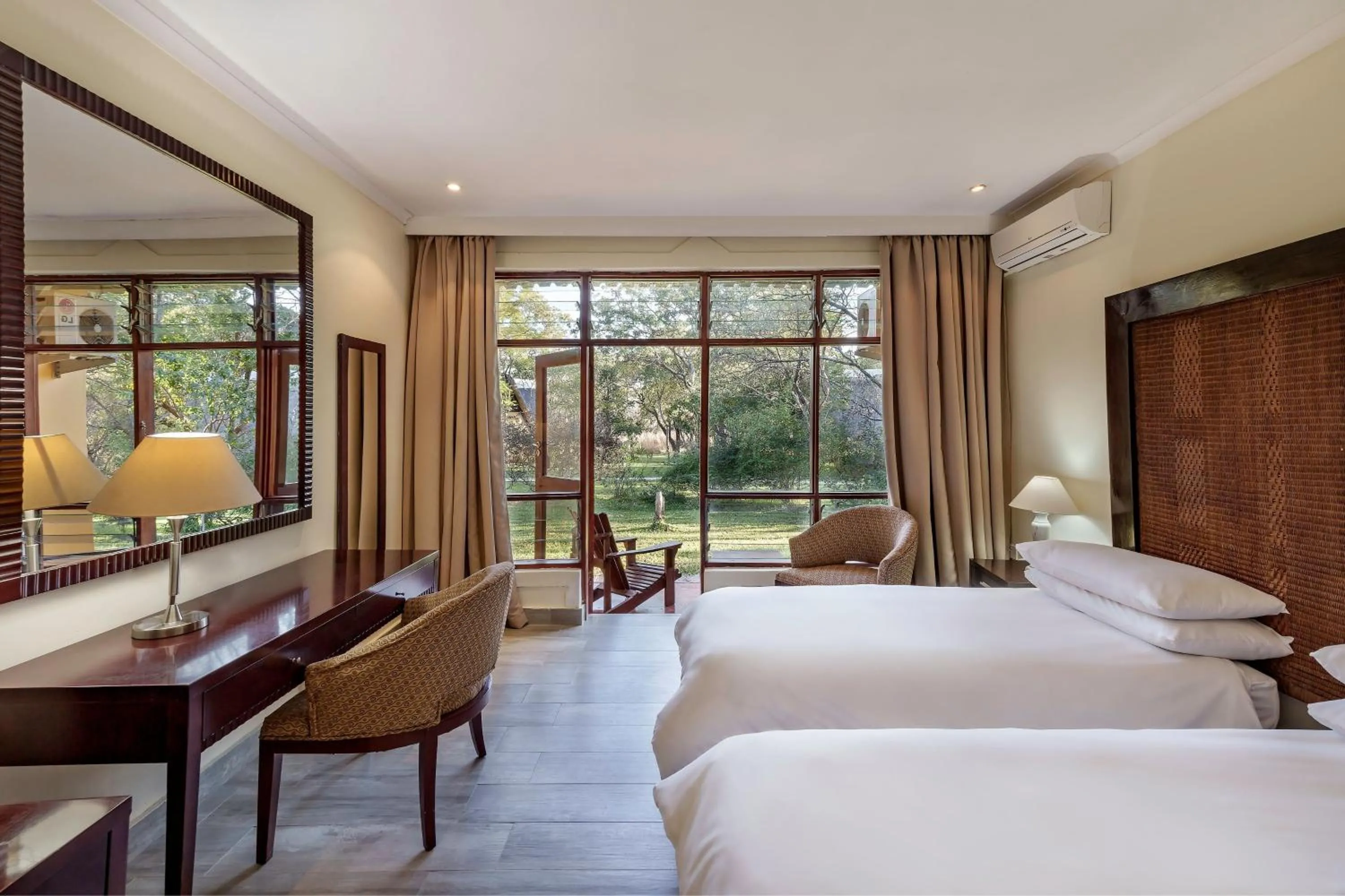Photo of the whole room, Bed in Protea Hotel by Marriott Lusaka Safari Lodge