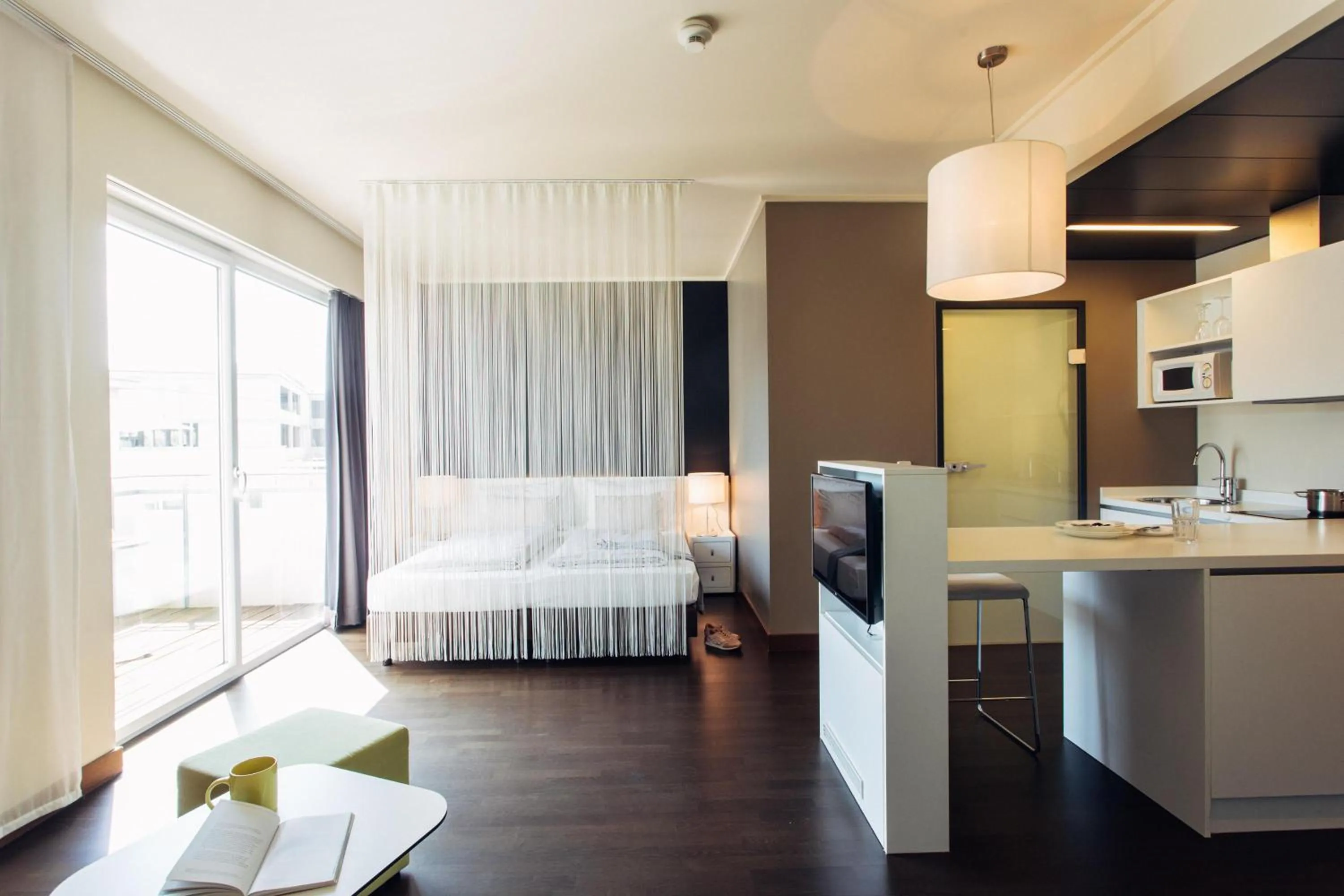 Photo of the whole room, Bed in harry's home Linz-Urfahr hotel & apartments