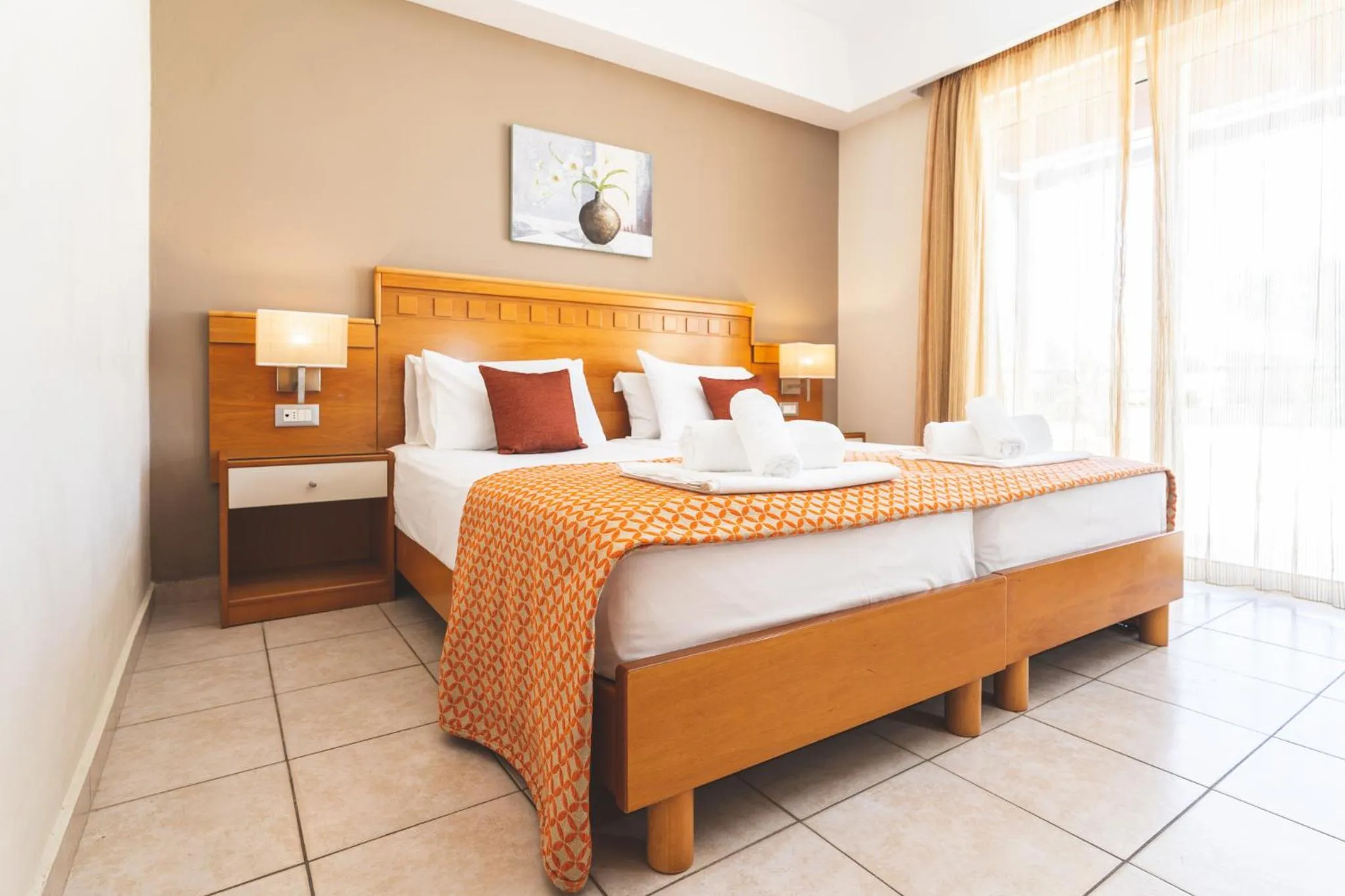 Bed in Helios Apartments