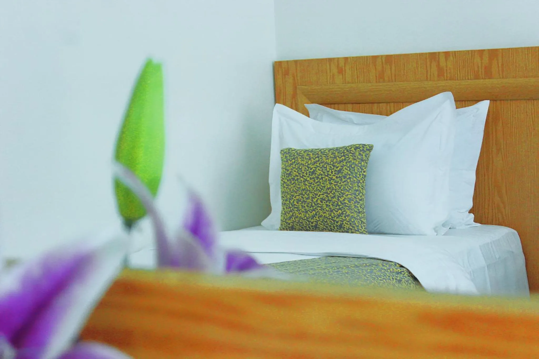 Bed in Majliss Hotel Downtown