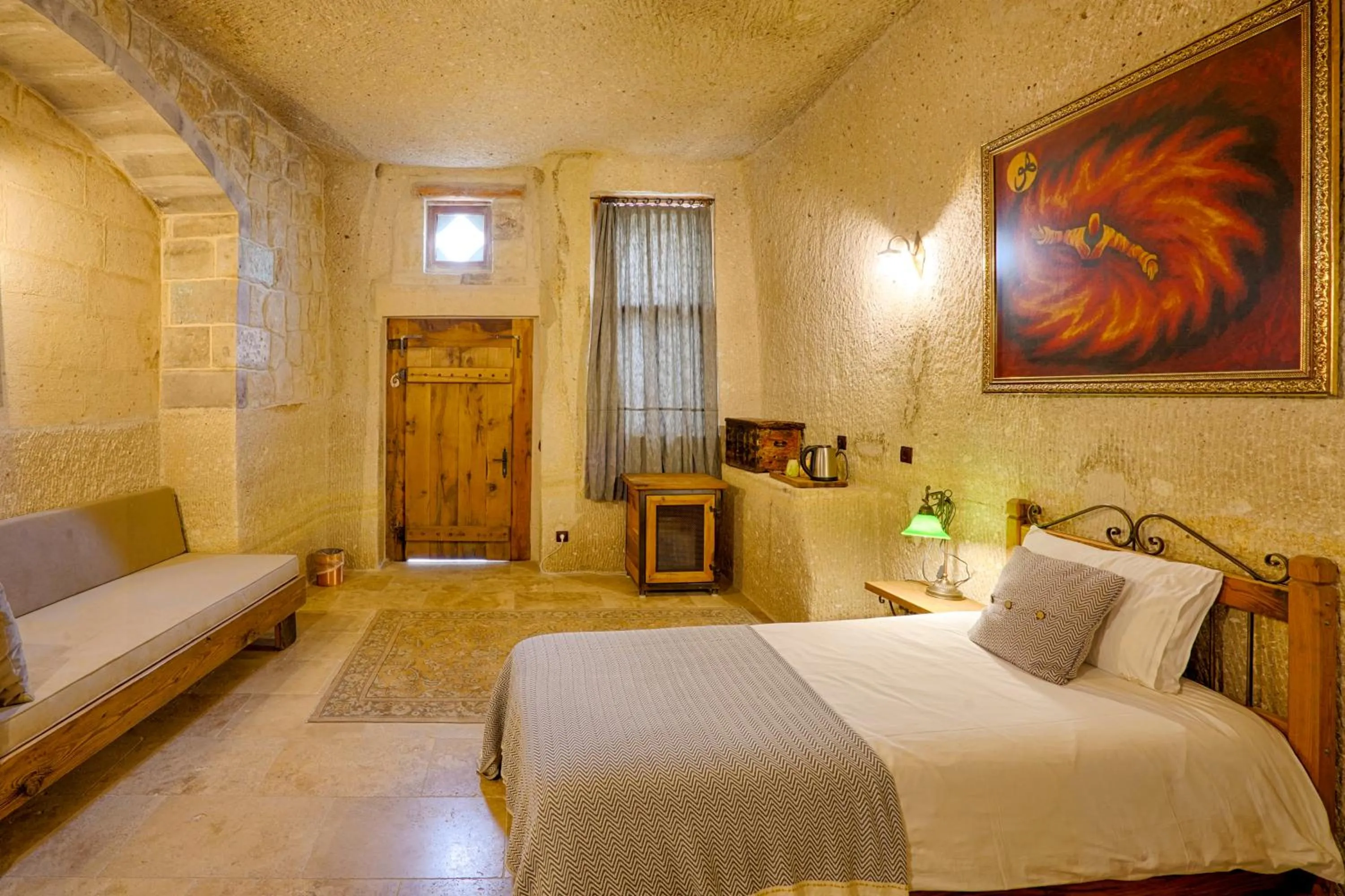 Living room, Bed in Design Cave Hotel