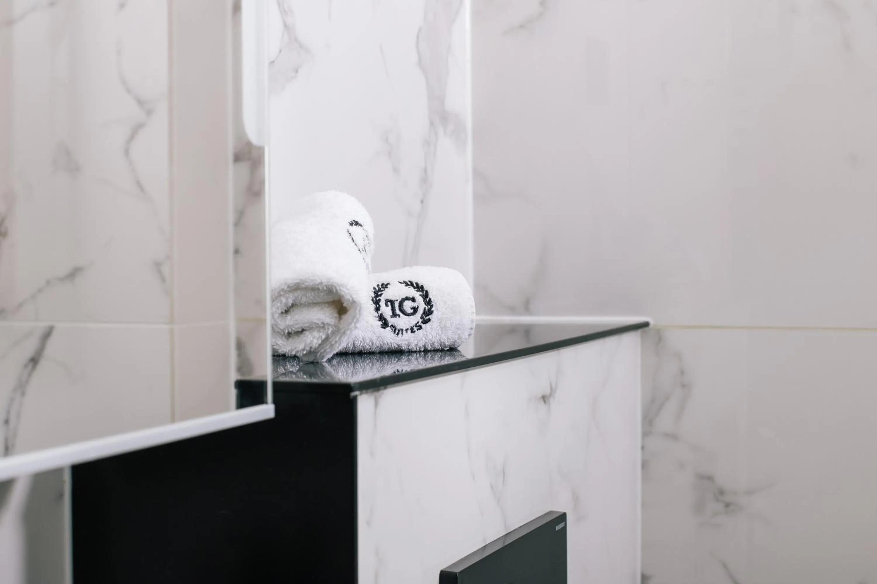 Property logo or sign in TG Hotel Apartments Budapest