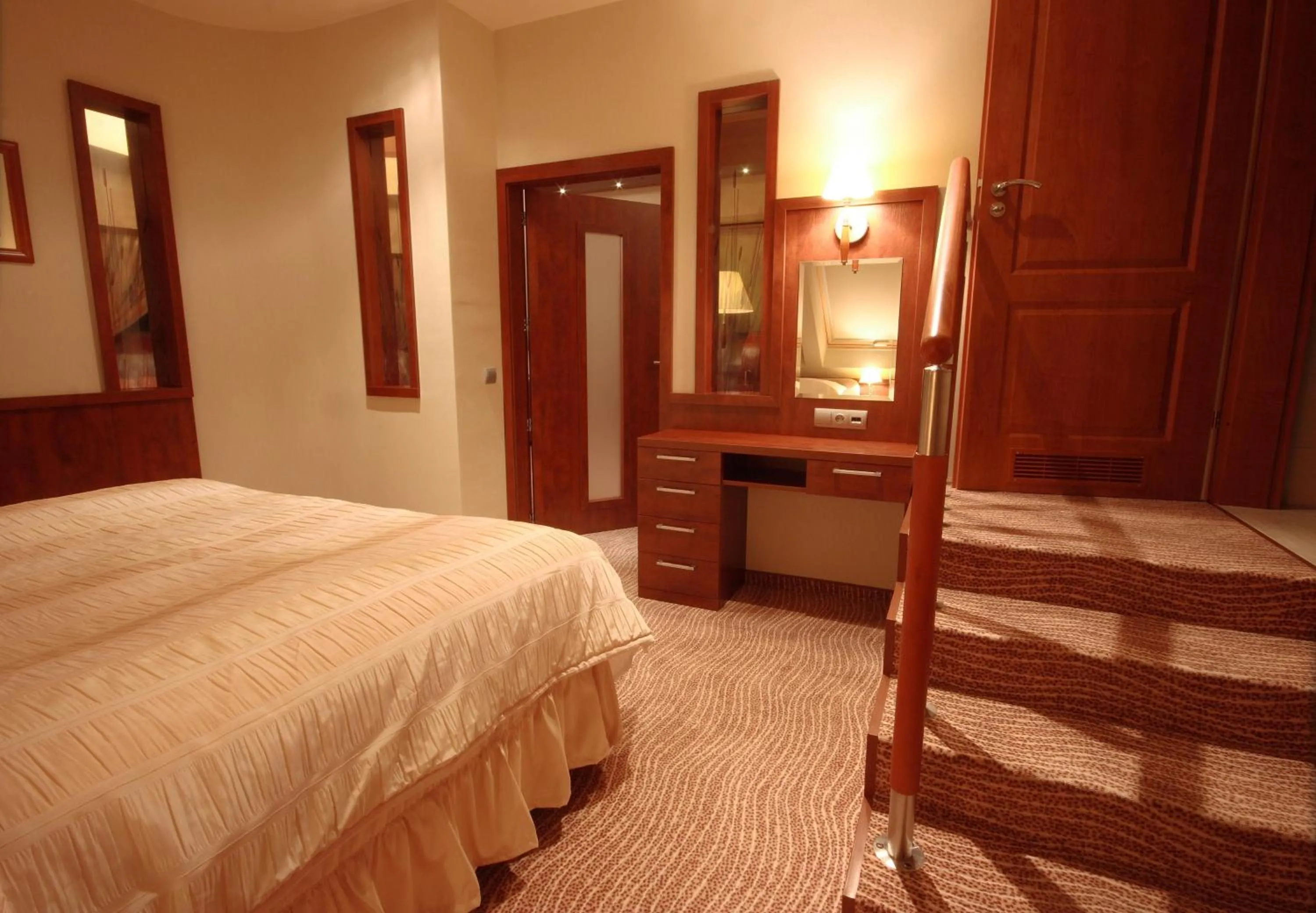 Seating area, Bed in Hotel Sahara