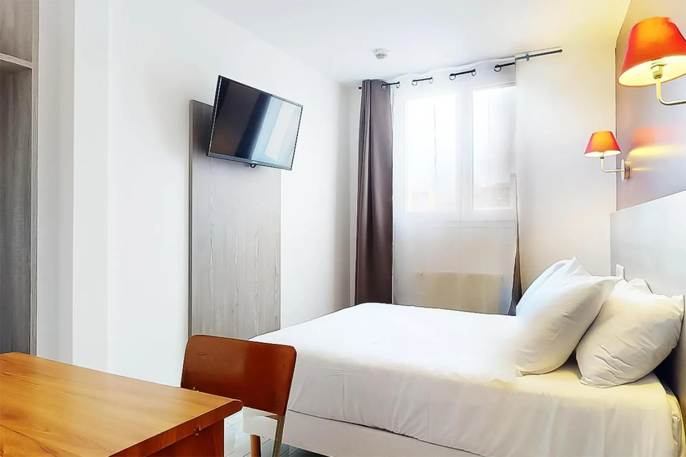 Bed in Hôtel de Ménilmontant