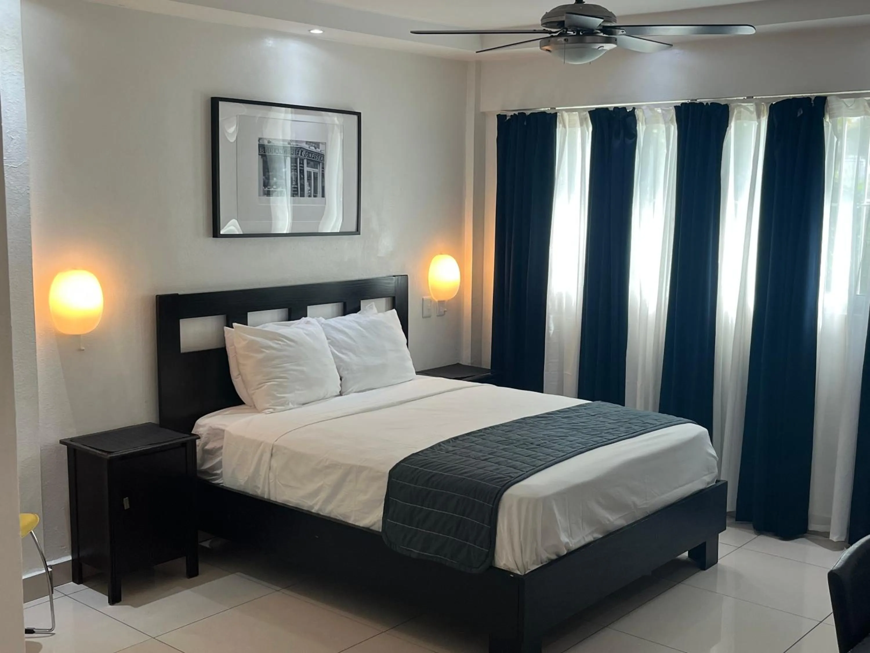 Bed in City Caribbean Hotel Boutique