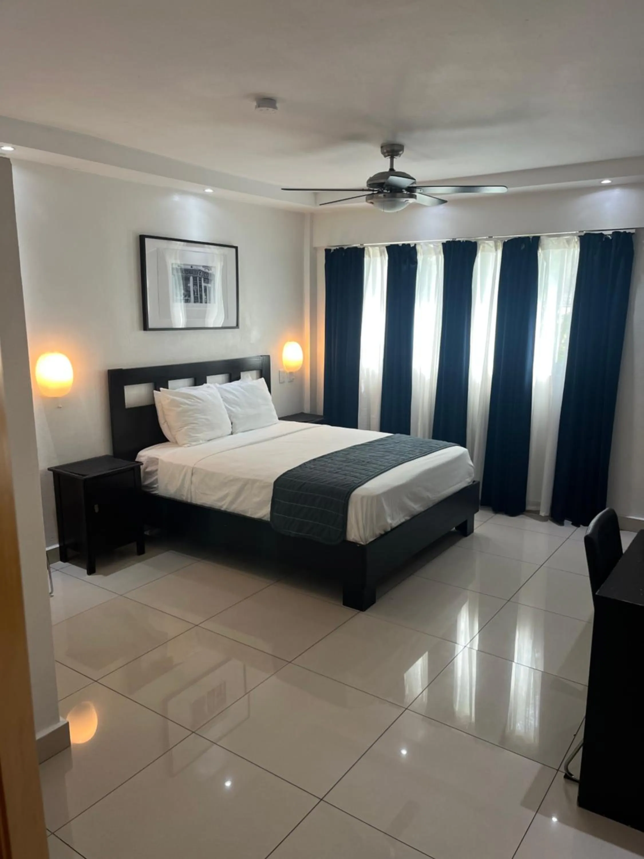 Bed in City Caribbean Hotel Boutique