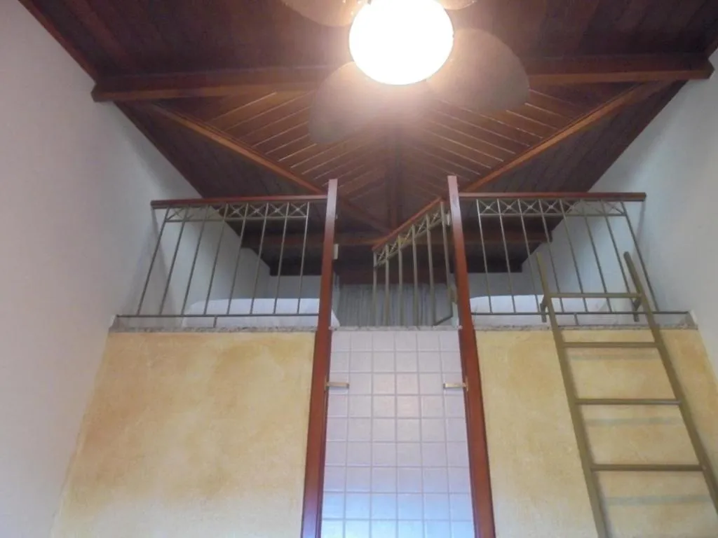 Bed in Refugio do Saci Hotel