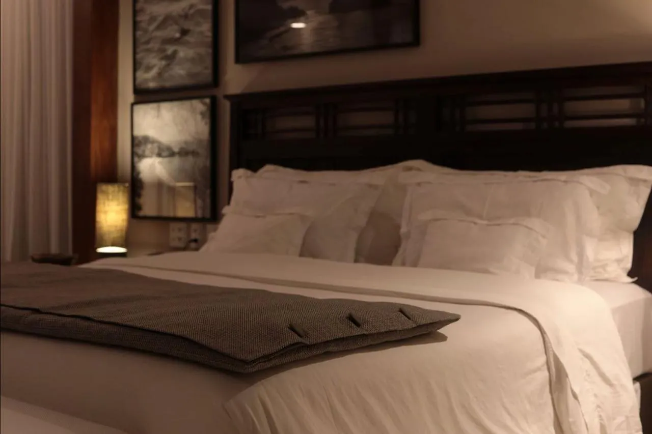 Bed in Pousada Zé Maria