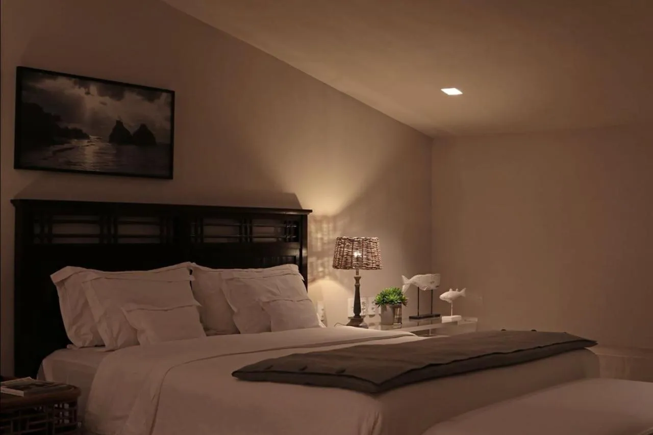 Bed in Pousada Zé Maria