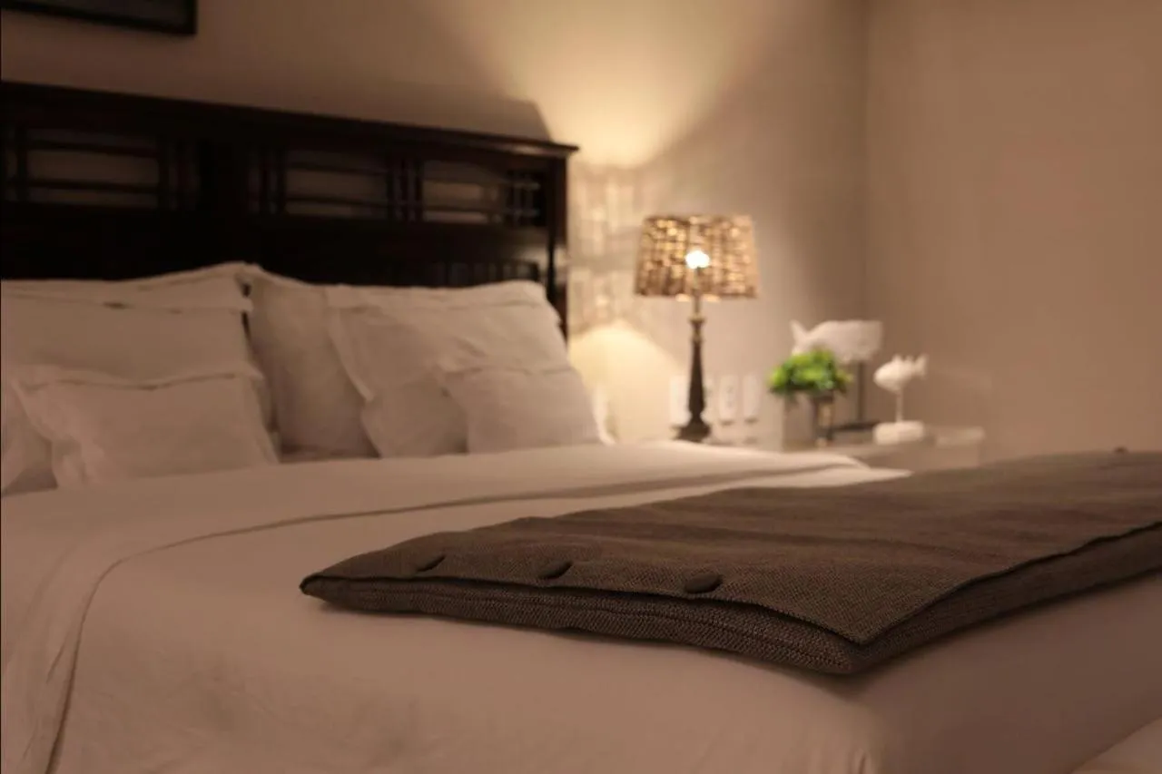 Bed in Pousada Zé Maria