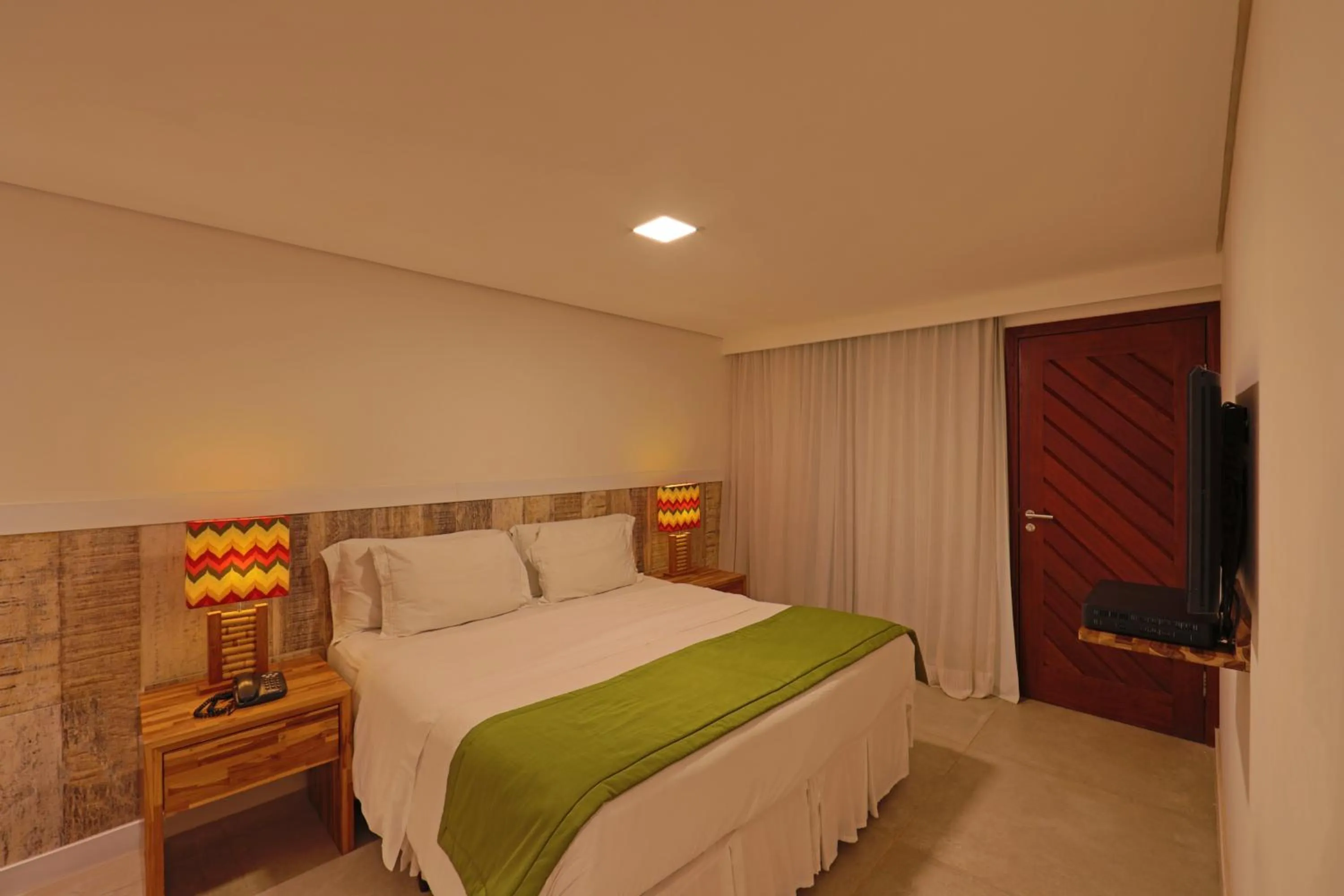 Bed in Pousada Zé Maria