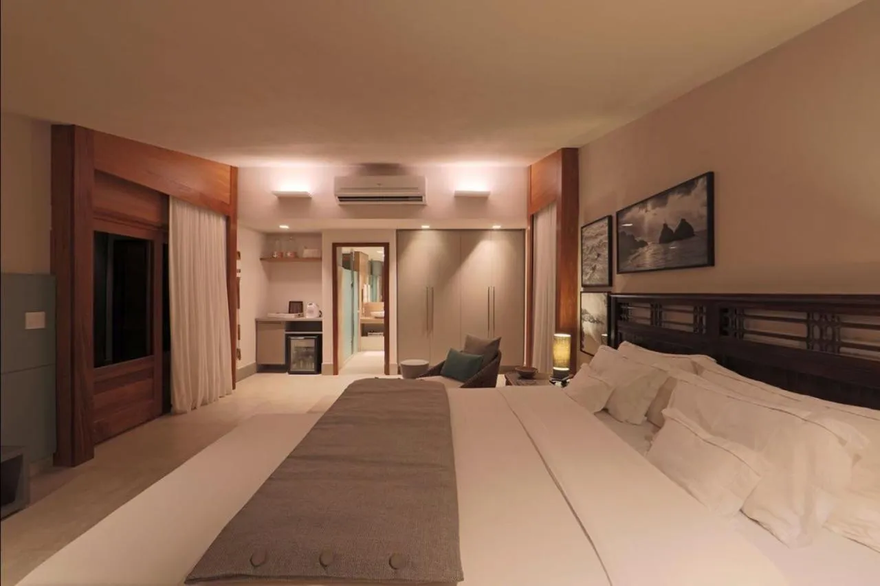 Bed in Pousada Zé Maria