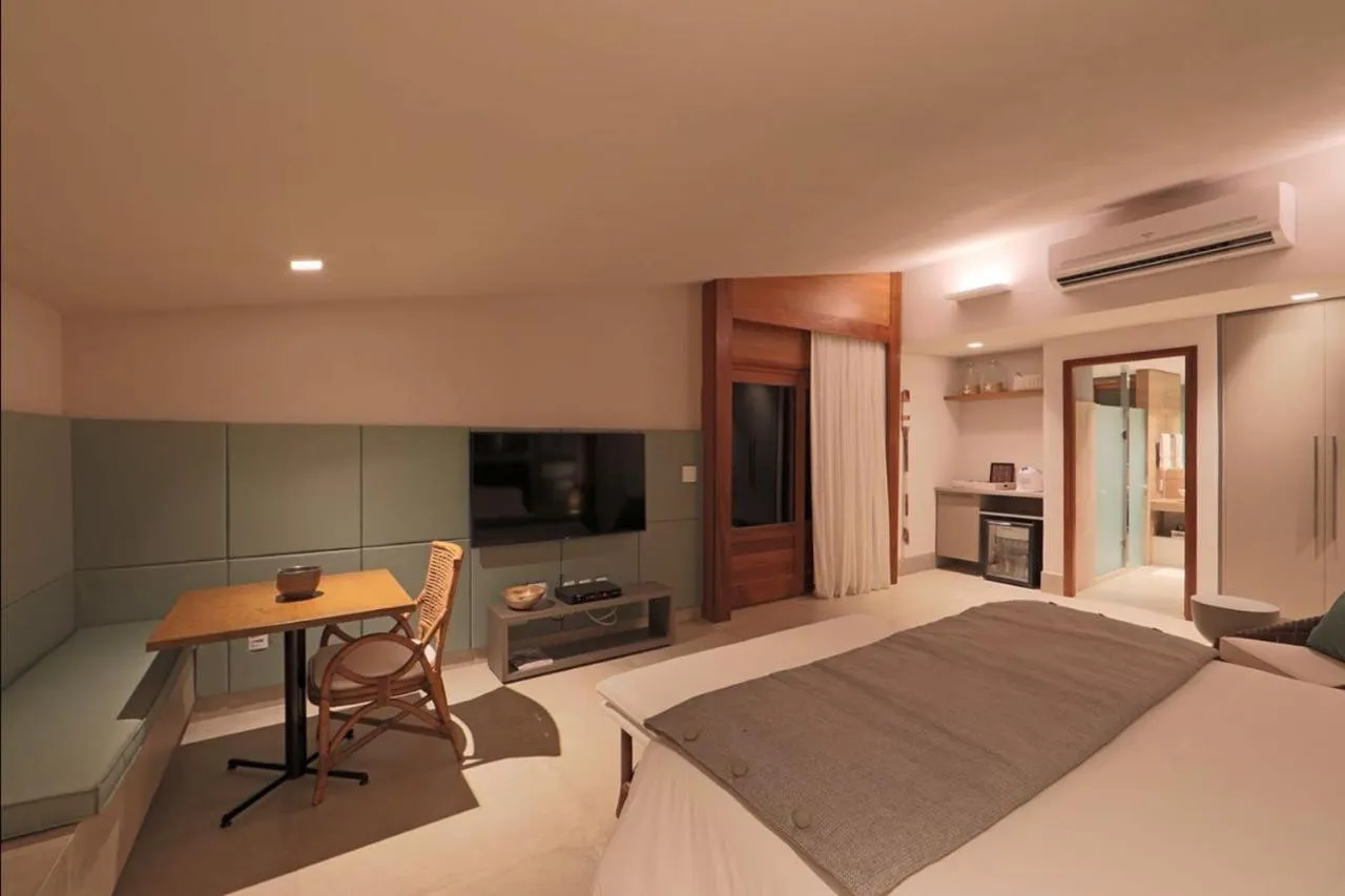 Bed in Pousada Zé Maria