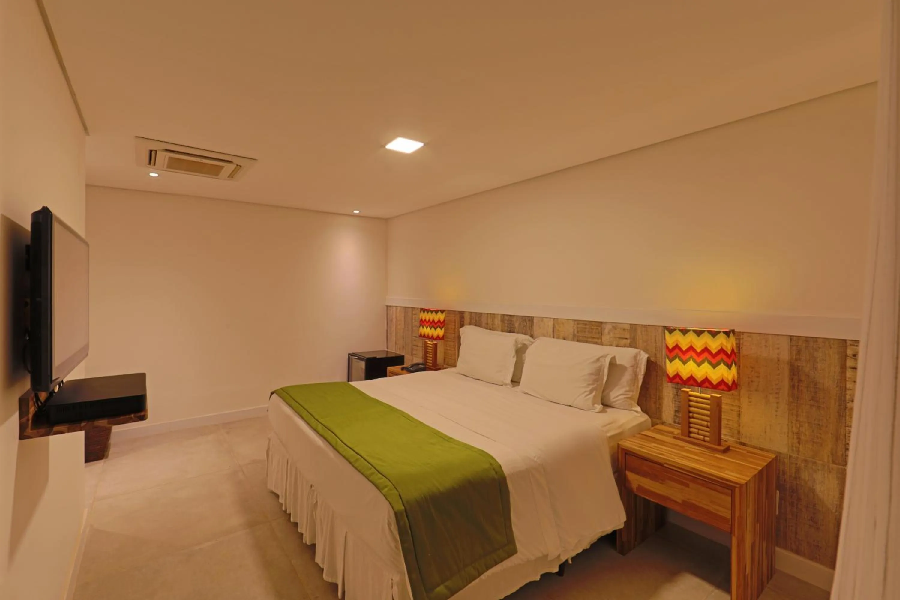 Bed in Pousada Zé Maria