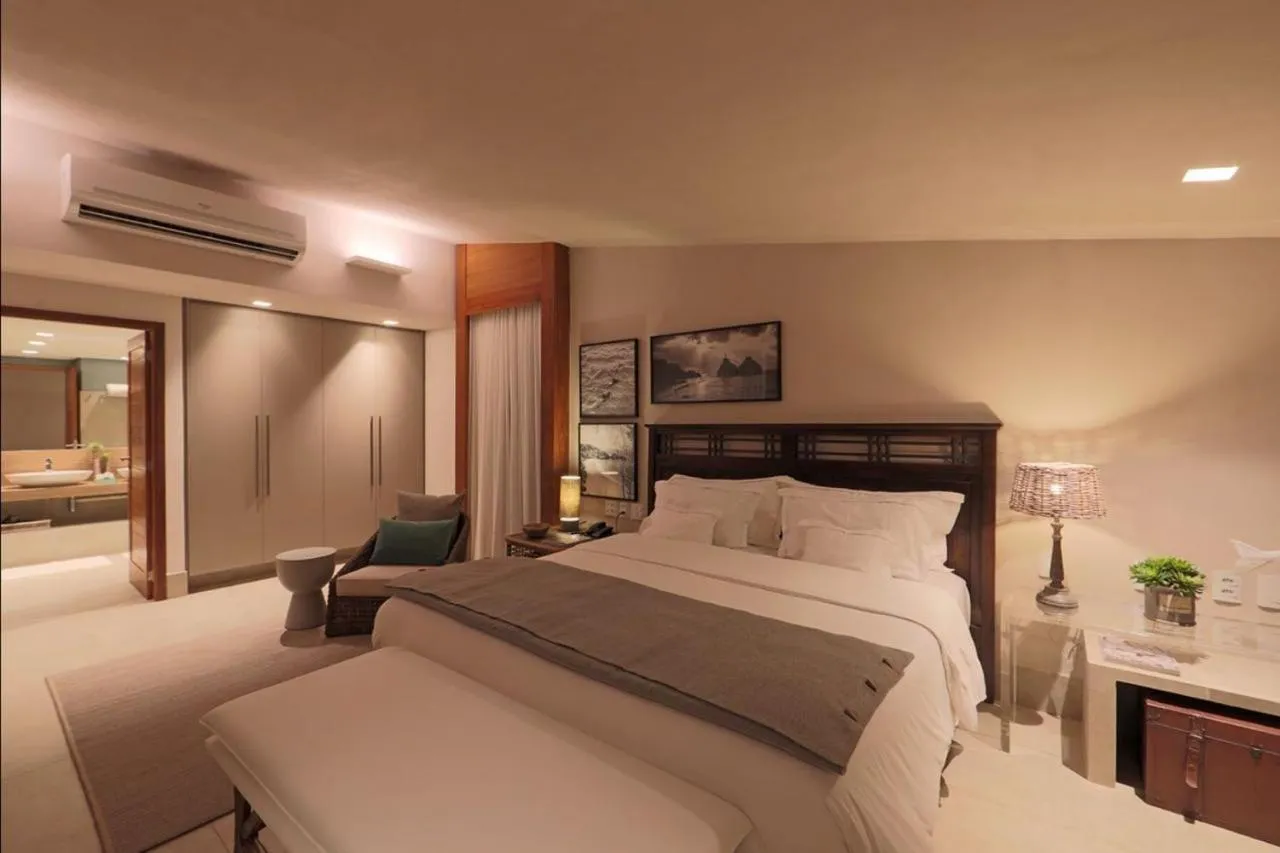 Bed in Pousada Zé Maria