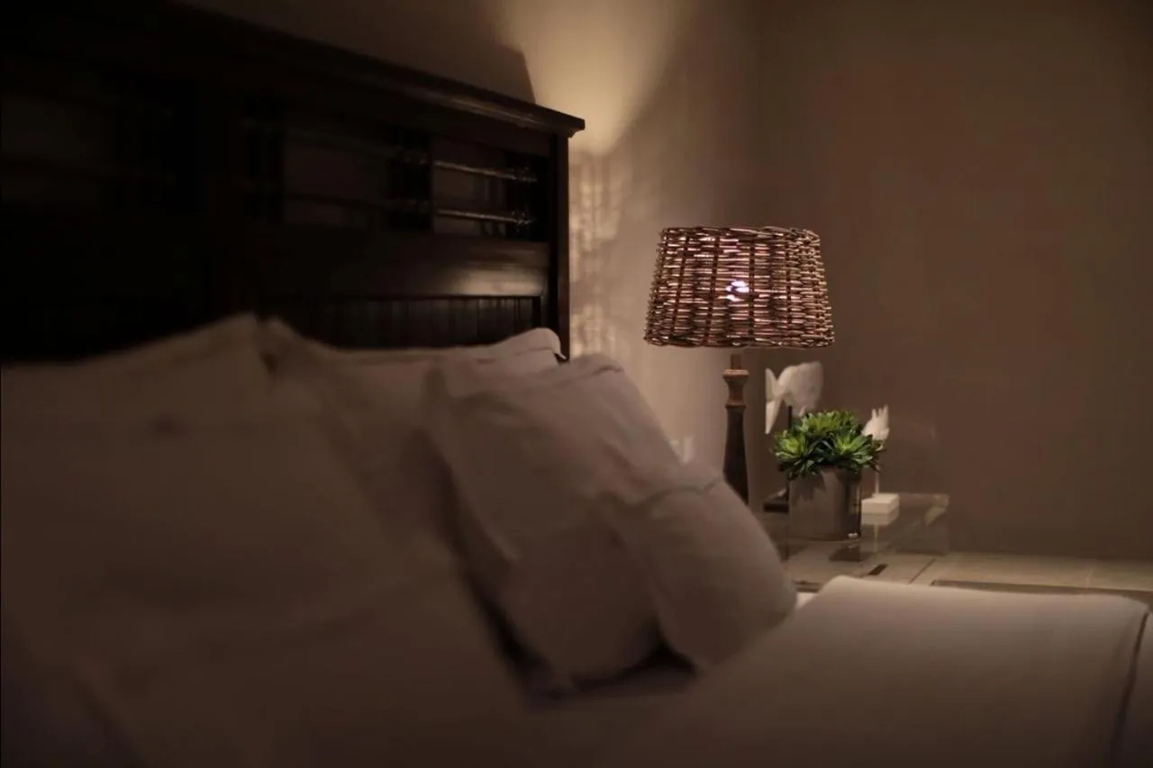 Bed in Pousada Zé Maria