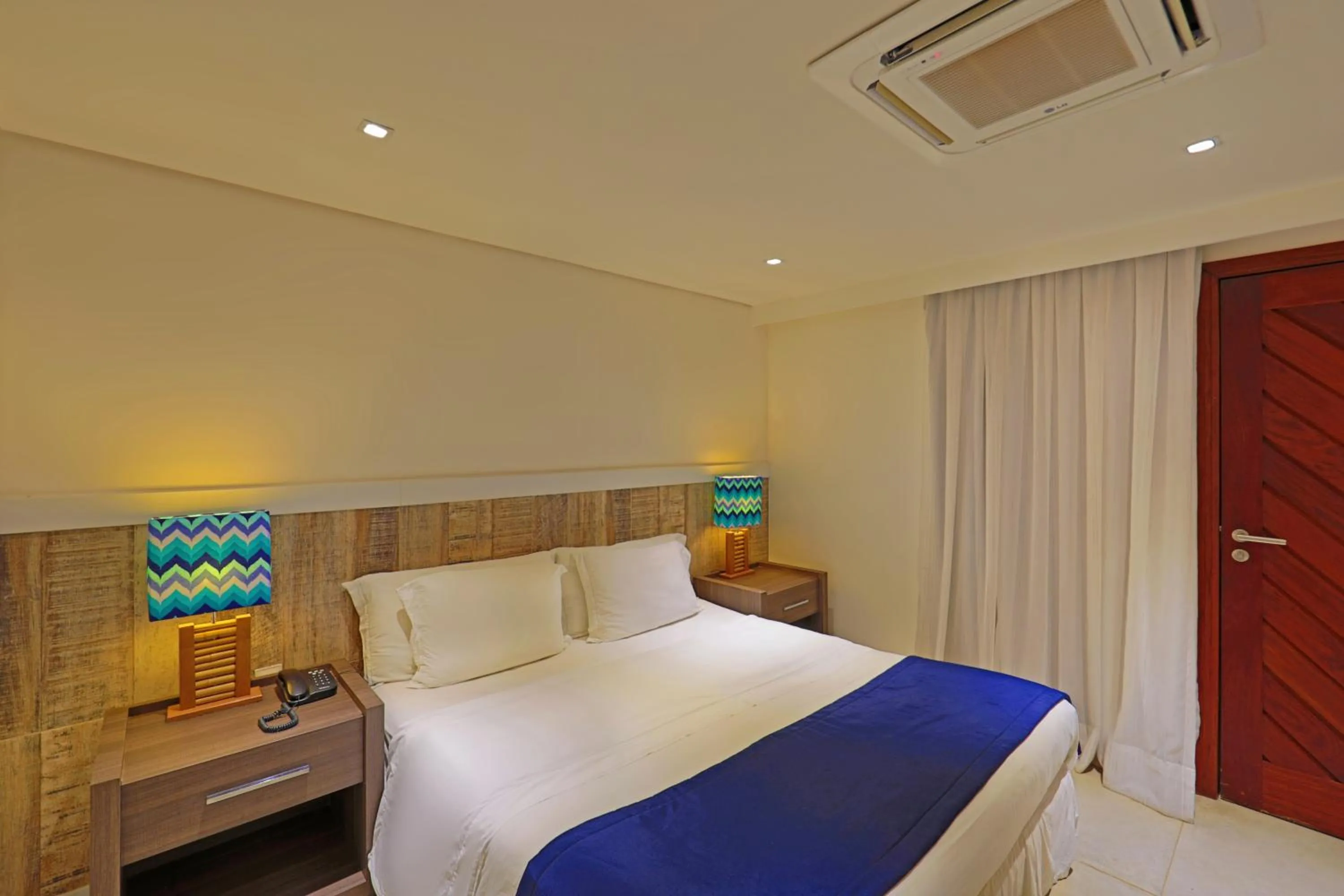 Bed in Pousada Zé Maria