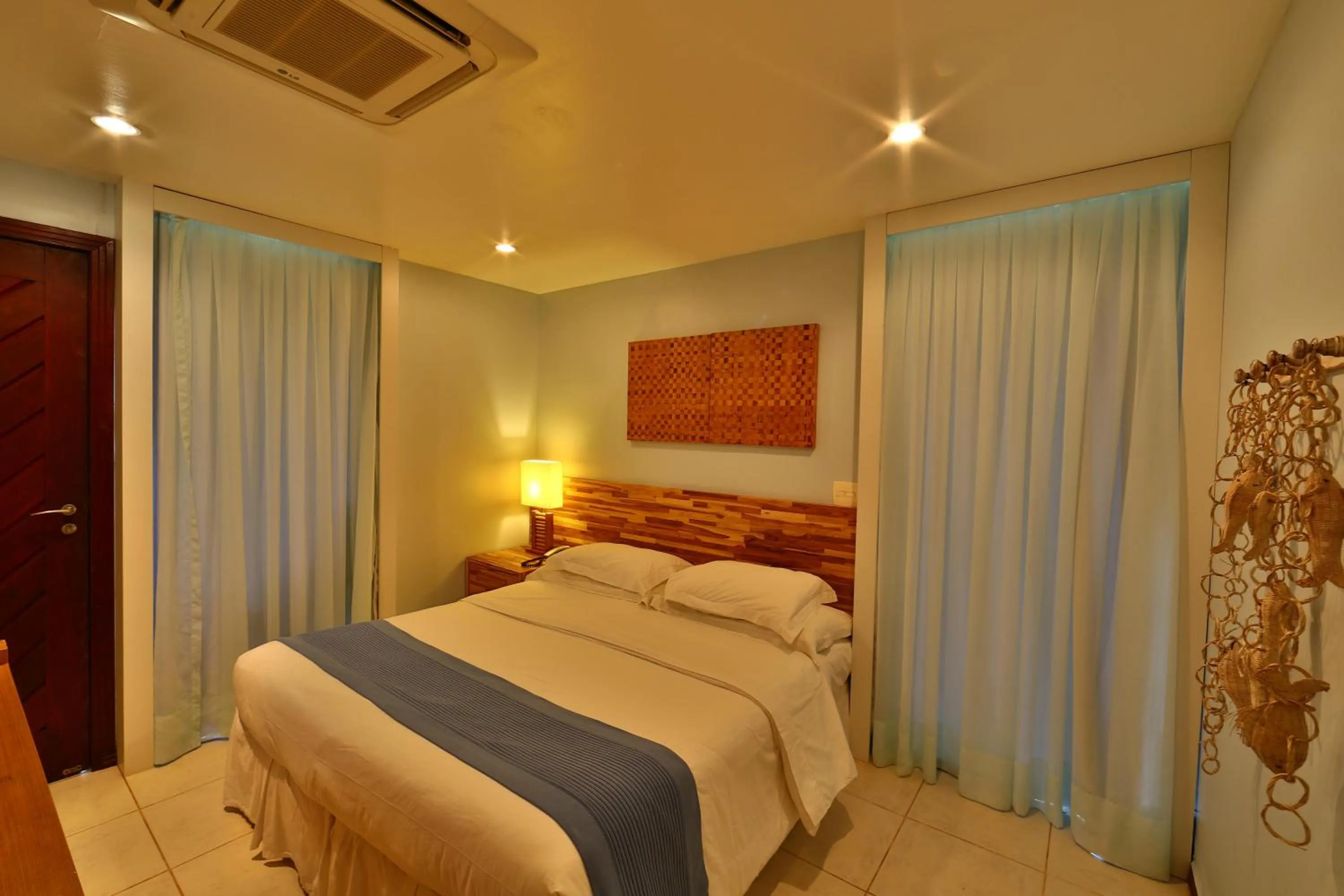 Bed in Pousada Zé Maria